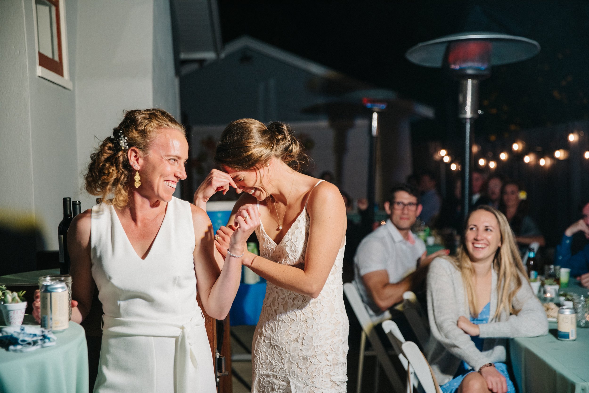 www.santabarbarawedding.com | Lerina Winter | Danny Miles | The Tent Merchant | MacLaren Roberts | Lulus | Nordstrom | Brides Listening to Speeches at Reception