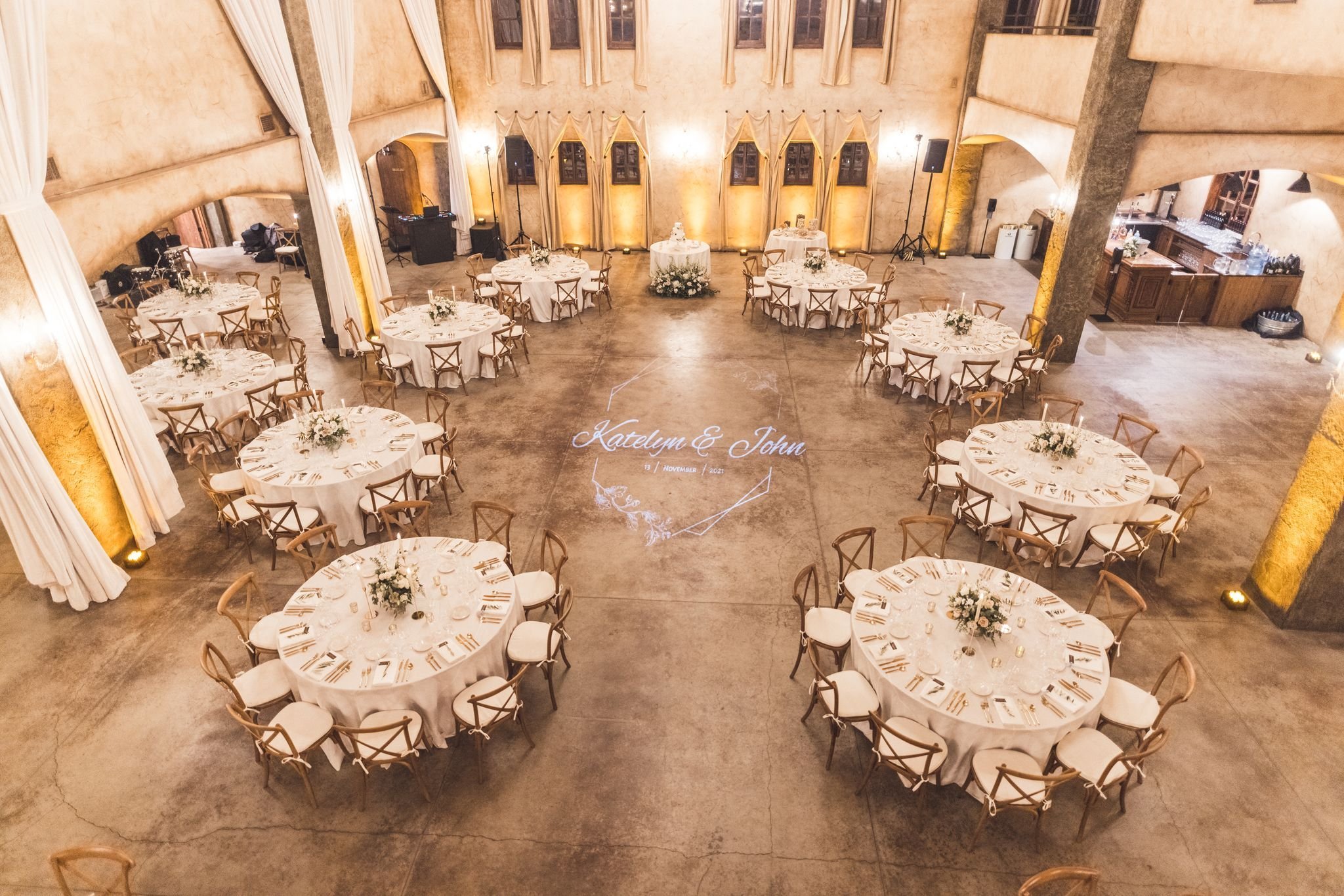 www.santabarbarawedding.com | Epic Entertainment | Reception Set Up Shot From Above with a Light Projection of the Couple’s Names