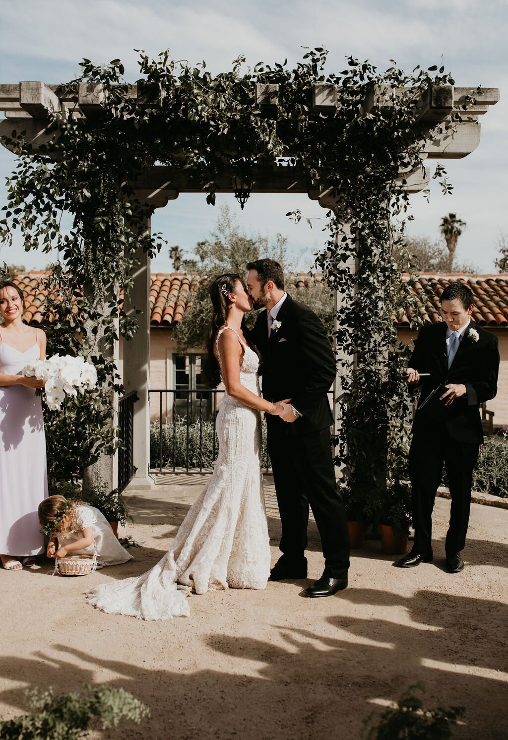 www.santabarbarawedding.com | Felici Events | SB Historical Museum | Ashley Taylor Photography | Ella &amp; Louie | Ventura Rentals | LunaBella | Bride and Groom Kiss at Ceremony 