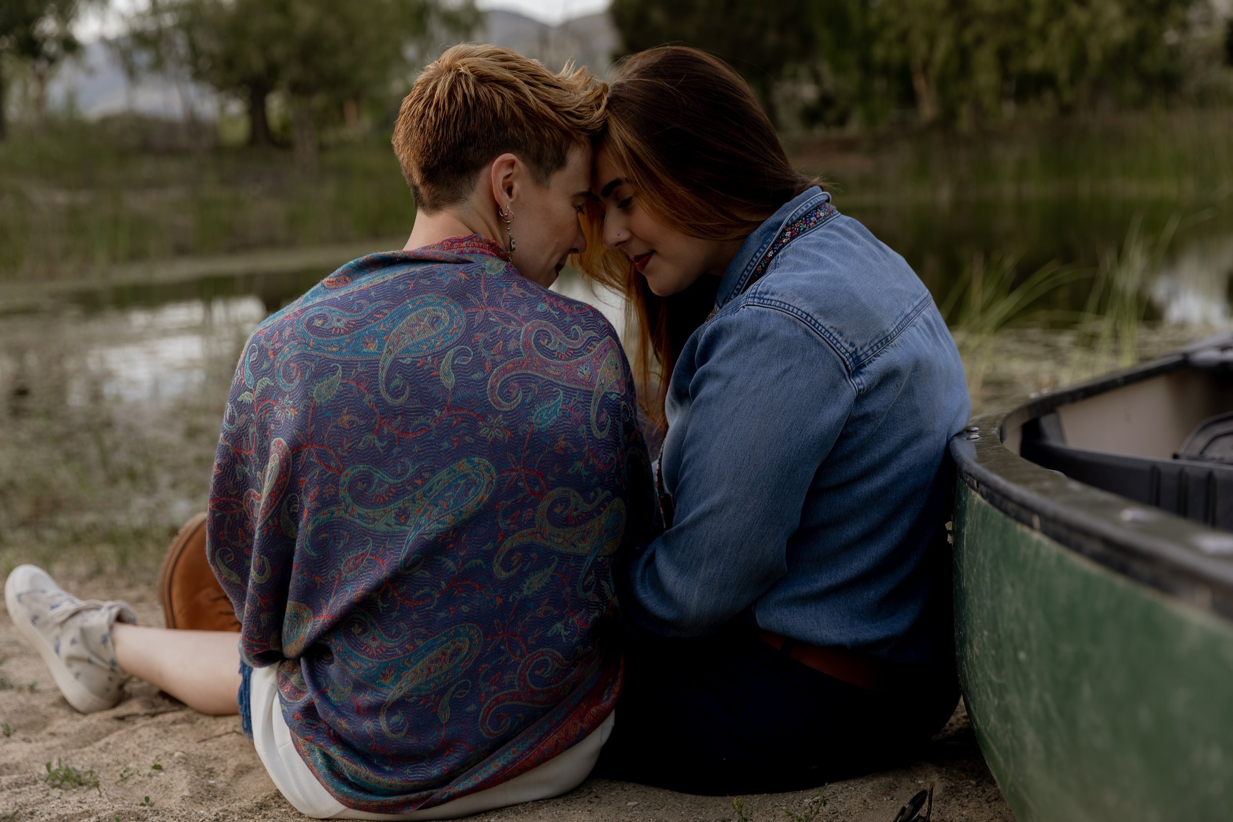 www.santabarbarawedding.com | MacKenzie Rana Photography | Fish House San Luis Obispo | Couple Leaning on a Canoe Together at Engagement Shoot