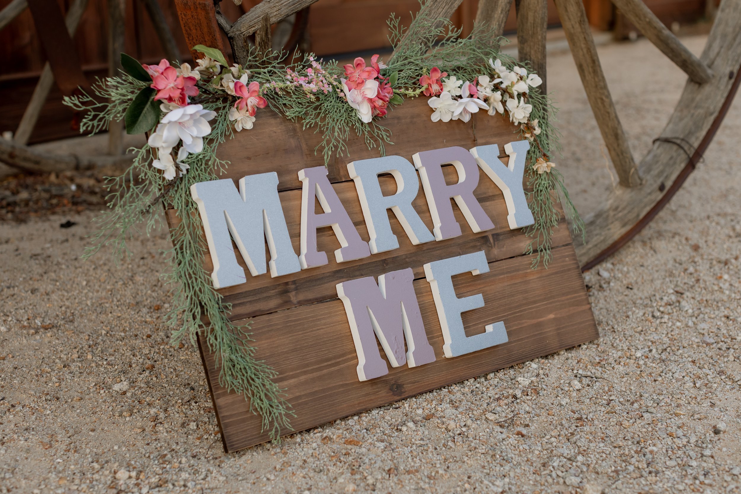 www.santabarbarawedding.com | MacKenzie Rana Photography | Fish House San Luis Obispo | Marry Me Sign at  Engagement Shoot