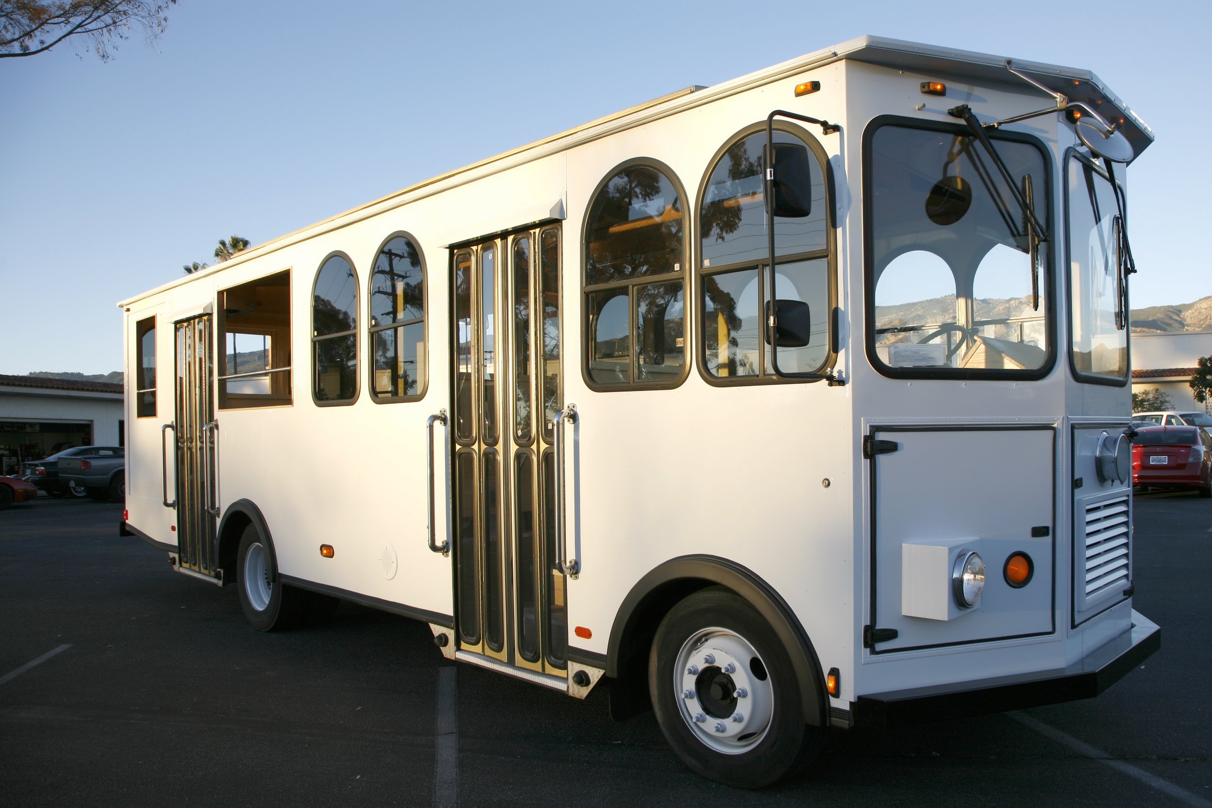www.santabarabarawedding.com | Rockstar Transportation | White Trolley for Wedding Transportation 