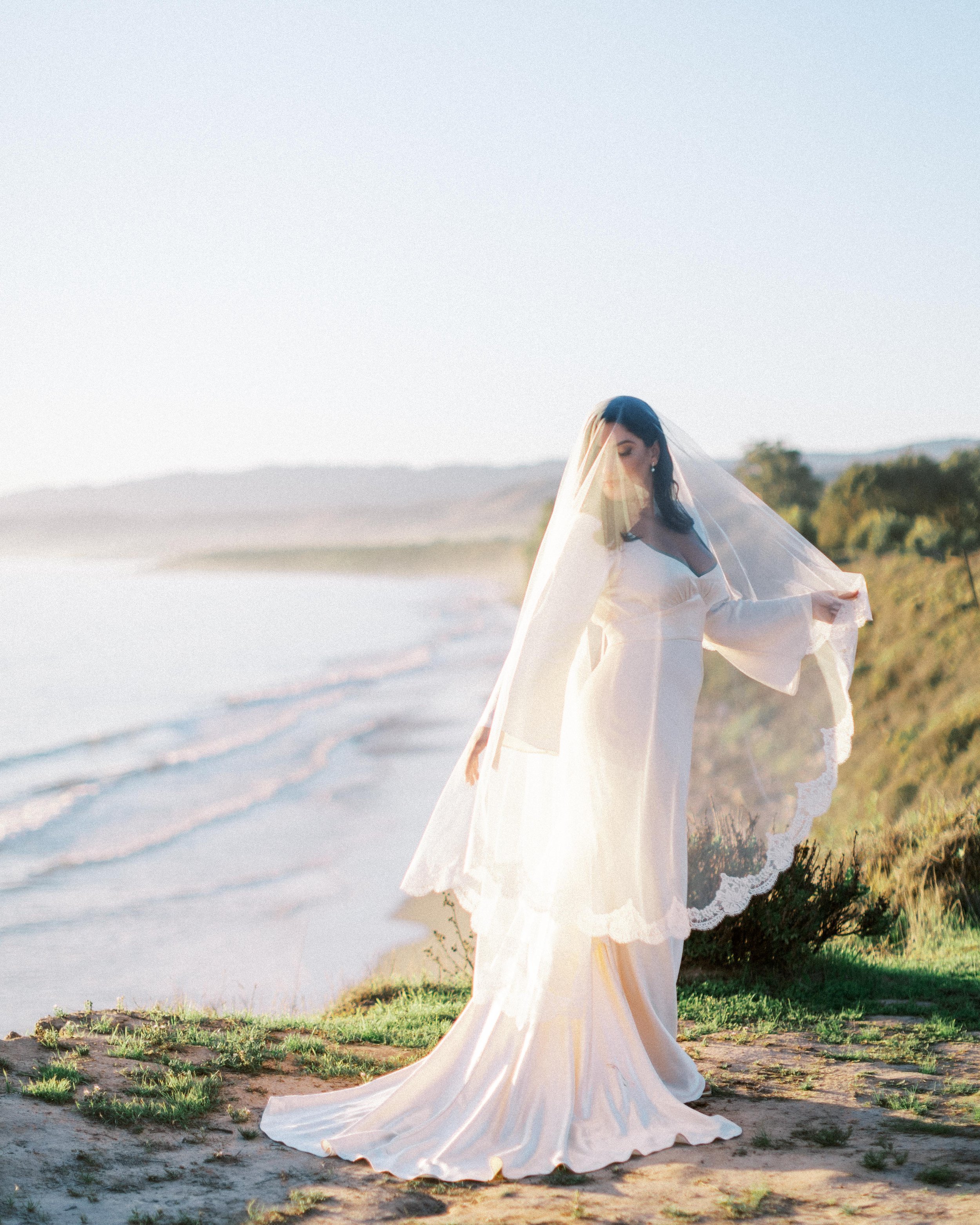 www.santabarbarawedding.com | Ivy Weddings &amp; Events | Madeleine Collins | Dos Pueblos Orchid Farm | Boho Chic Dreams | Shona Joy | 805 Makeup | Bride Under Veil with Ocean in Background