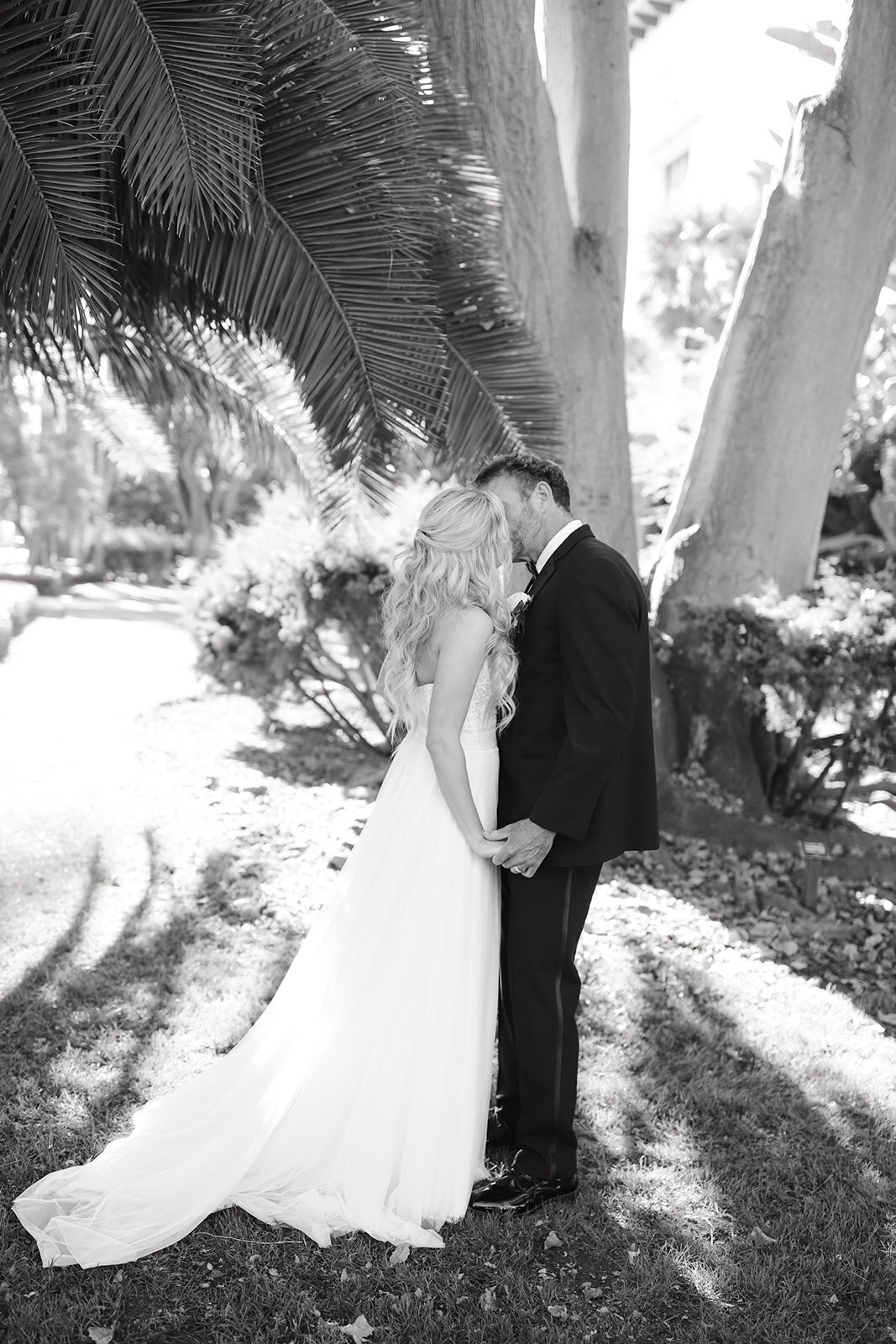 www.santabarbarawedding.com | Santa Barbara Courthouse | Blink Aesthetics | Santa Barbara Classic Weddings | The Dress Bride | Alexis Ireland Florals | Couple Kiss After the Ceremony
