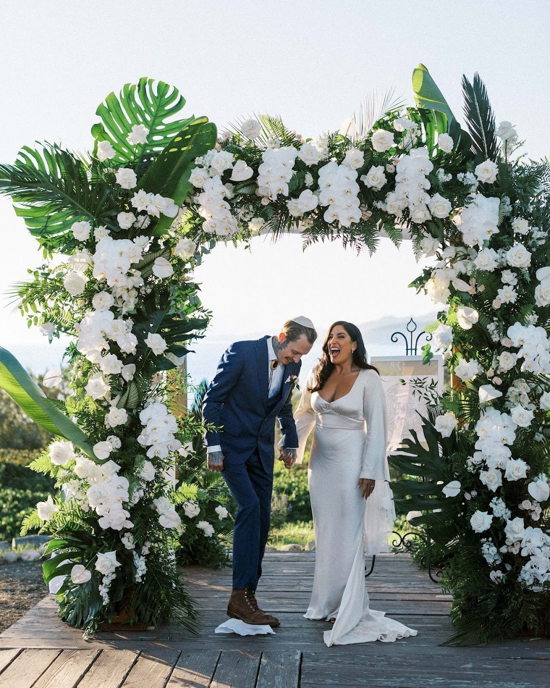 www.santabarbarawedding.com | Boho Chic Dreams | Madeleine Collins Photography | Ivy Weddings &amp; Events | Dos Pueblos Orchid Farm | Wedding Arch Covered in White Blooms