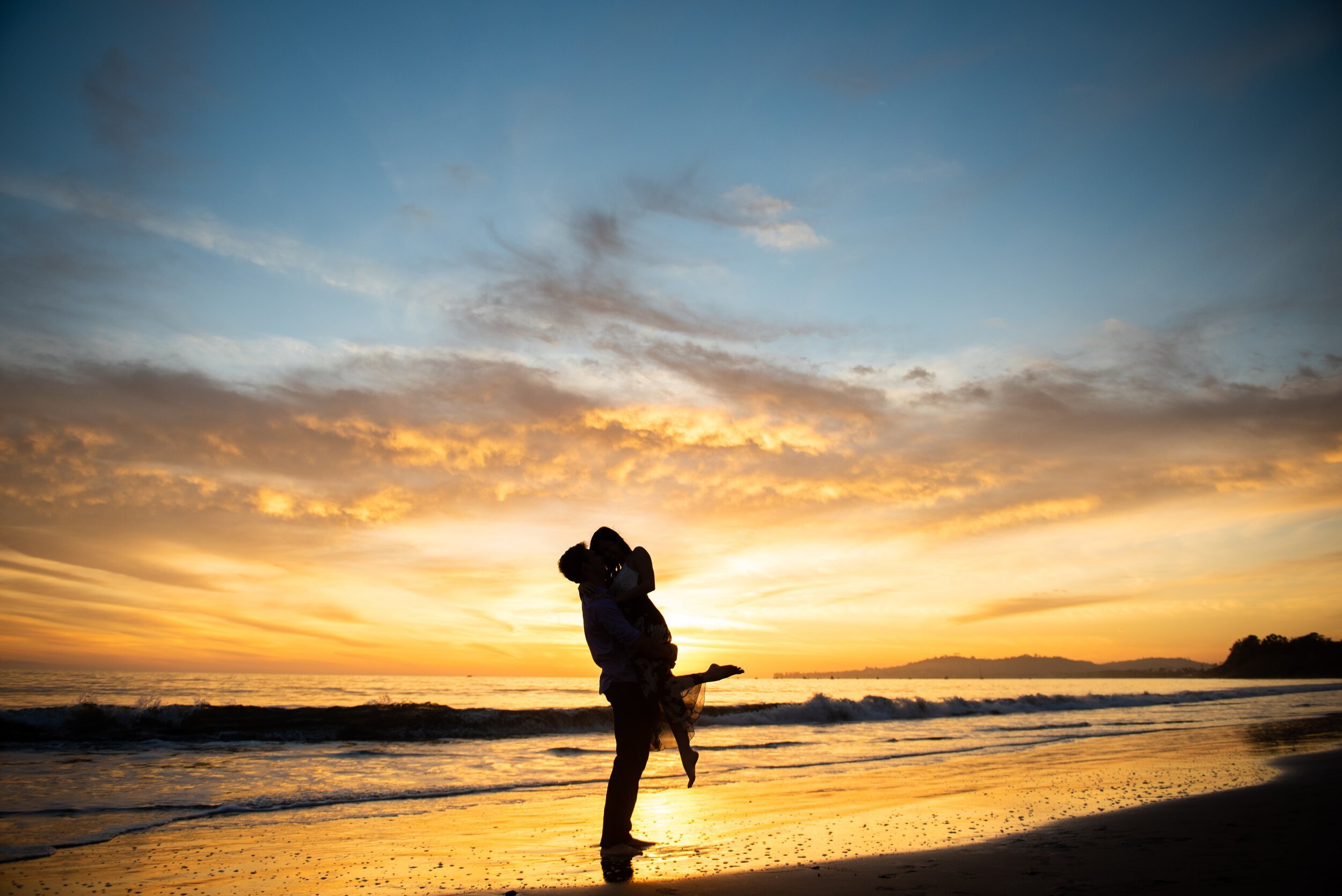 www.santabarbarawedding.com | Butterfly Beach | ByCherry Photography | Couple’s Silhouettes Embracing at Sunset