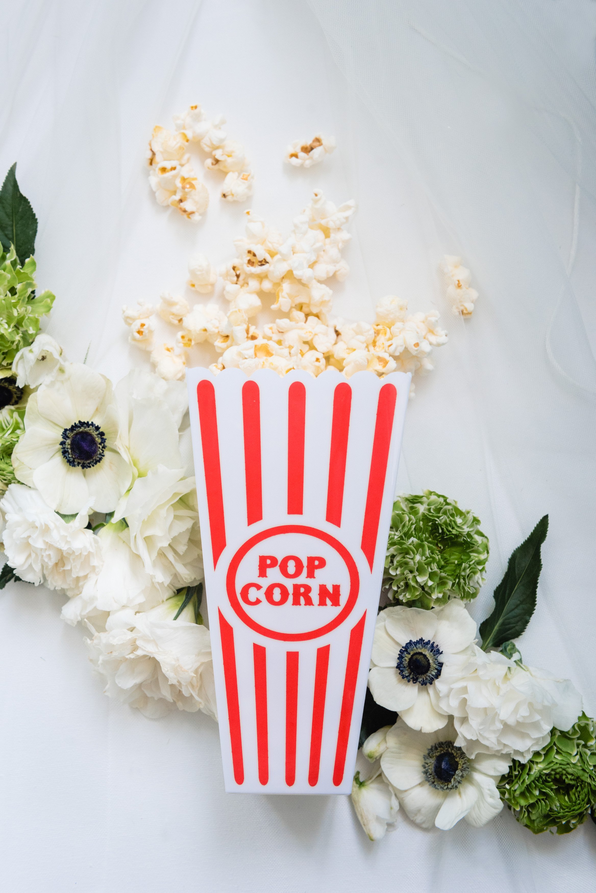 www.santabarbarawedding.com | Catering Connection | Jennifer Lourie Photography | Popcorn Spilling Out of Red and White Box