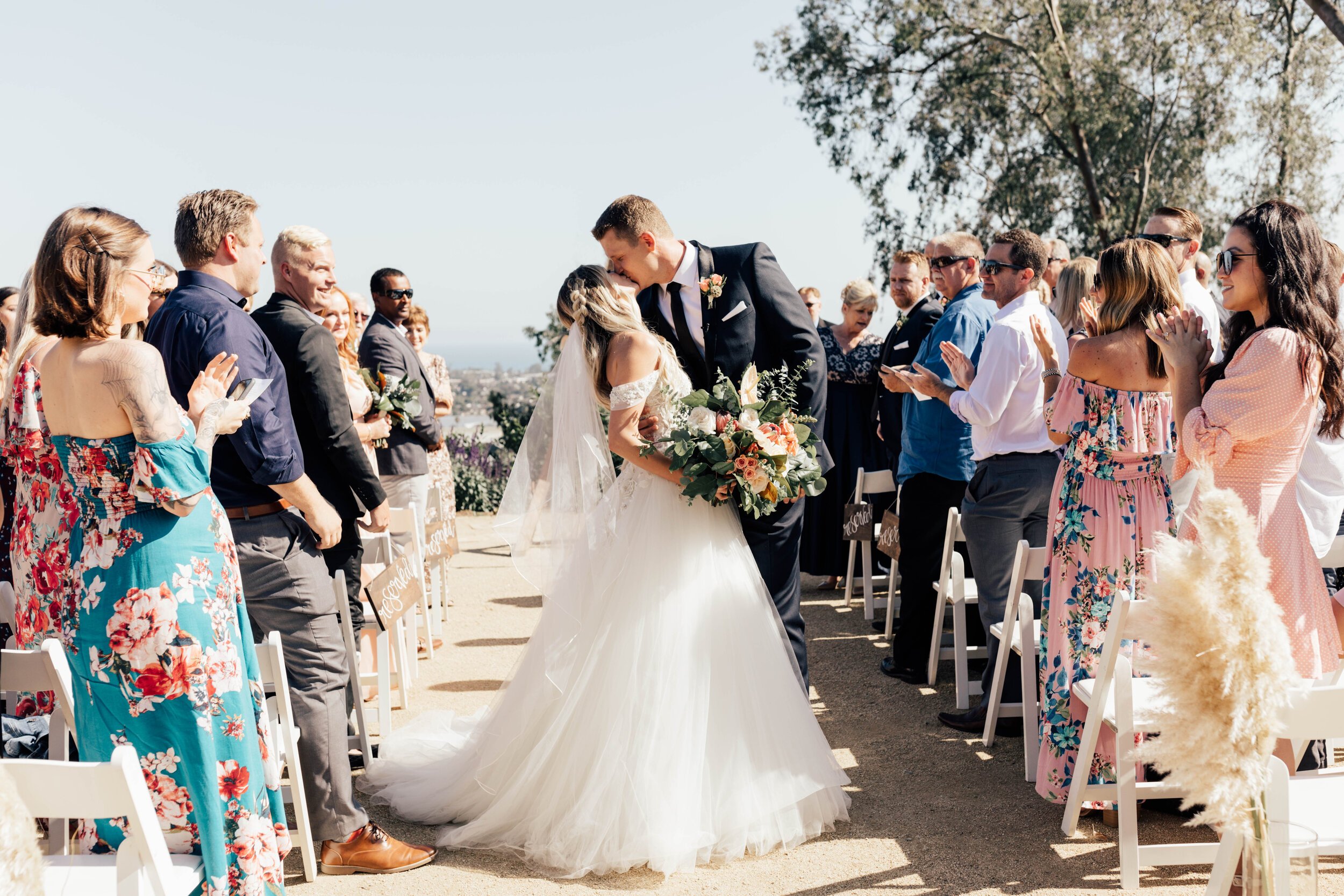 www.santabarbarawedding.com | Bria Peterson | Ocean View Farm | KB Events | Tangled Lotus | Nicquel | Amigo Party Rentals | Bride and Groom’s First Kiss at the Ceremony