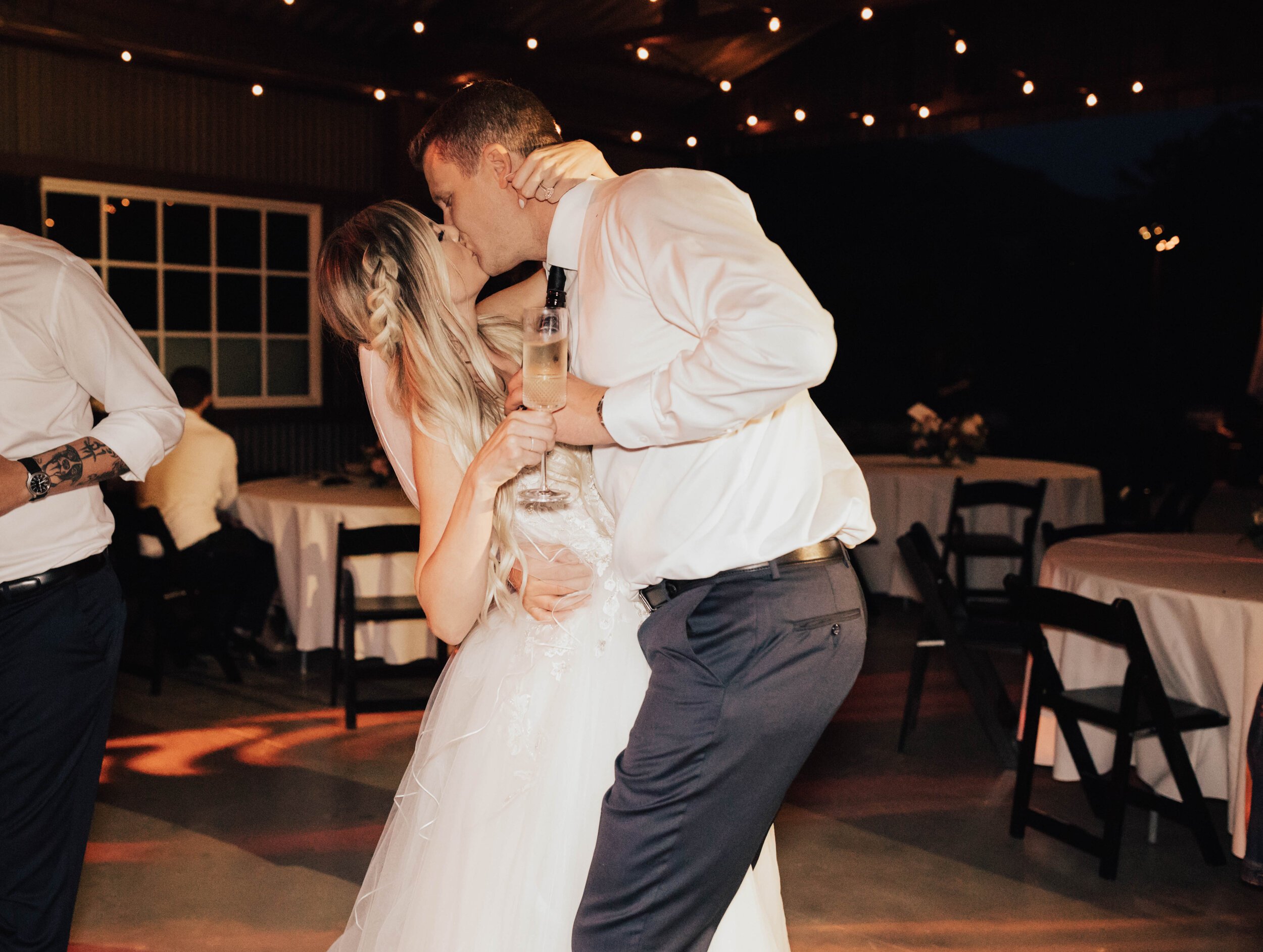 www.santabarbarawedding.com | Bria Peterson | Ocean View Farm | KB Events | Tangled Lotus  | SPARK Creative Events | Elite Disc Jockeys | Bride and Groom Share a Kiss on the Dance Floor