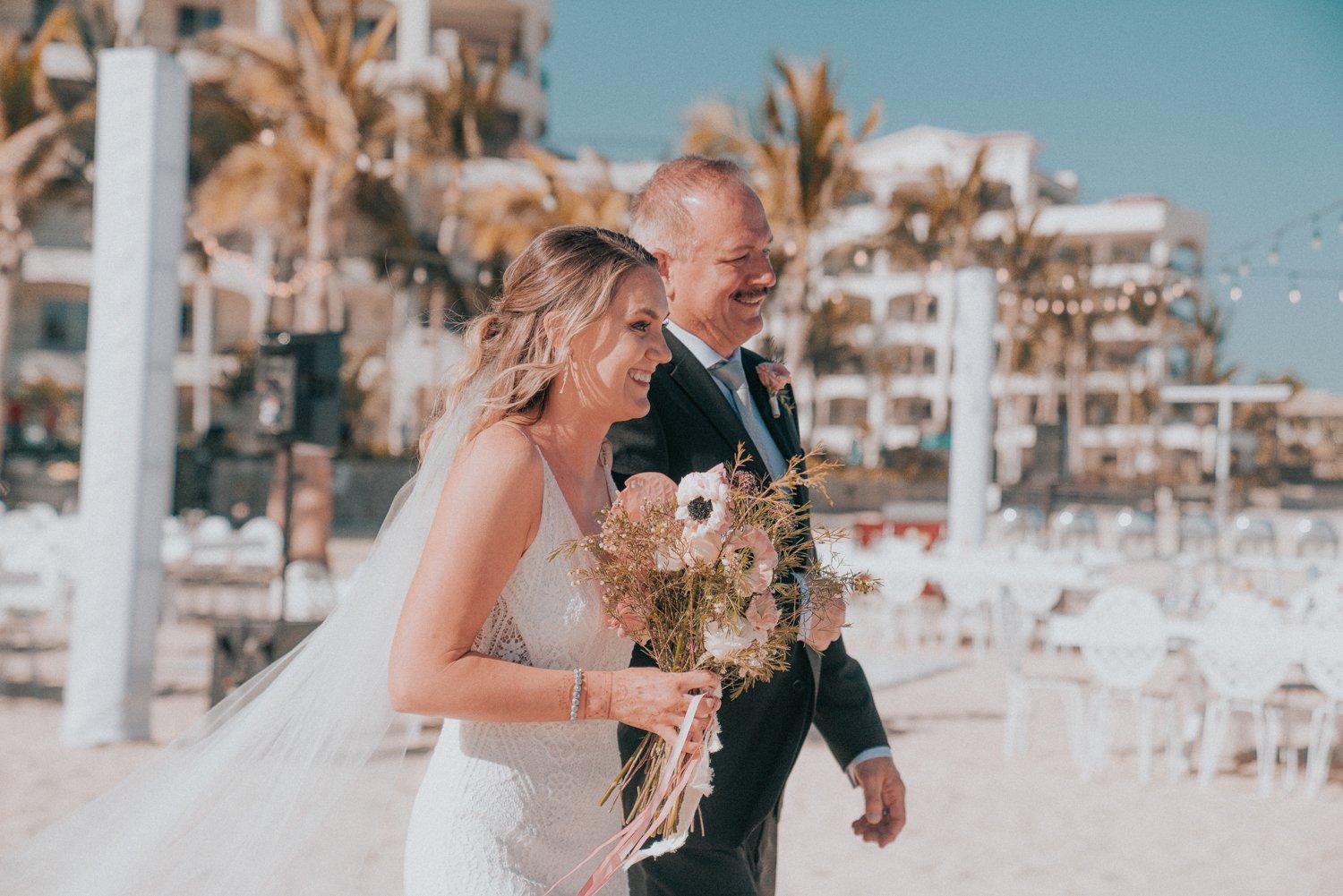 www.santabarbarawedding.com | Golden Glow Weddings | Hyatt Ziva Los Cabos | Diego Chavez | Addison Parrish | Bride Walking to Ceremony on the Beach with Father