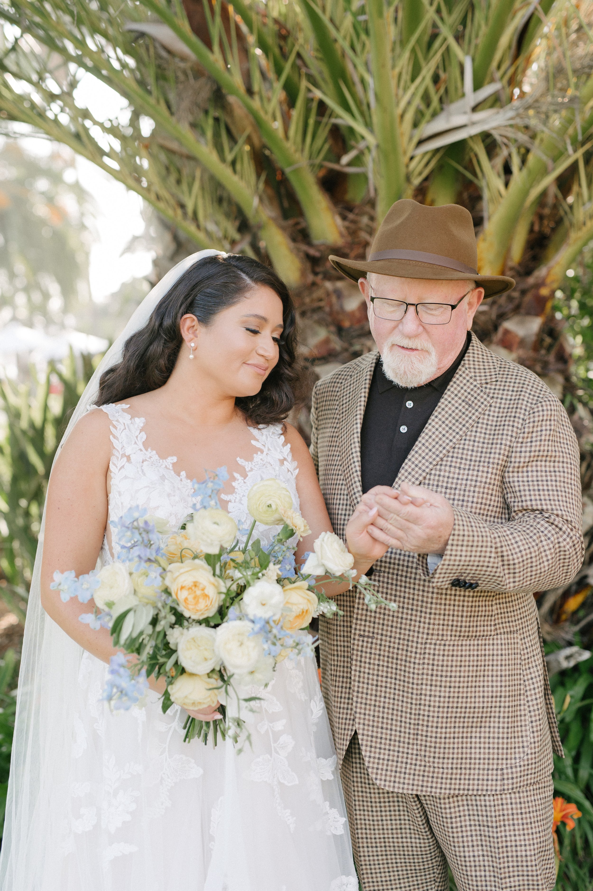 www.santabarbarawedding.com | Hoste Events | Haley Garces | Santa Barbara Inn | Fleur de Rye | NV Glam Studio | Father Looking at the Bride’s Wedding Ring 