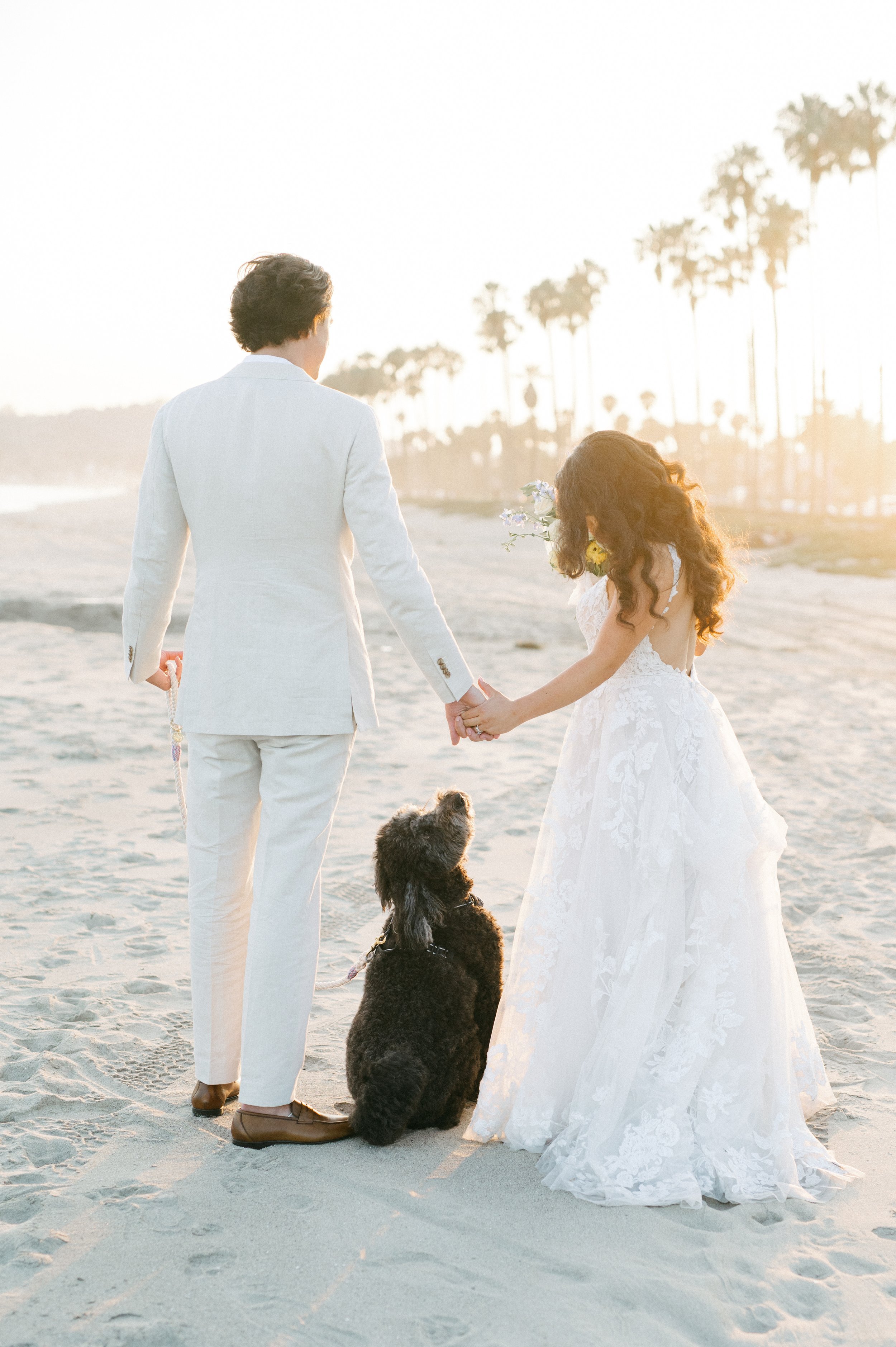 www.santabarbarawedding.com | Hoste Events | Haley Garces | Santa Barbara Inn | Fleur de Rye | NV Glam Studio | Couple on the Beach with Their Dog