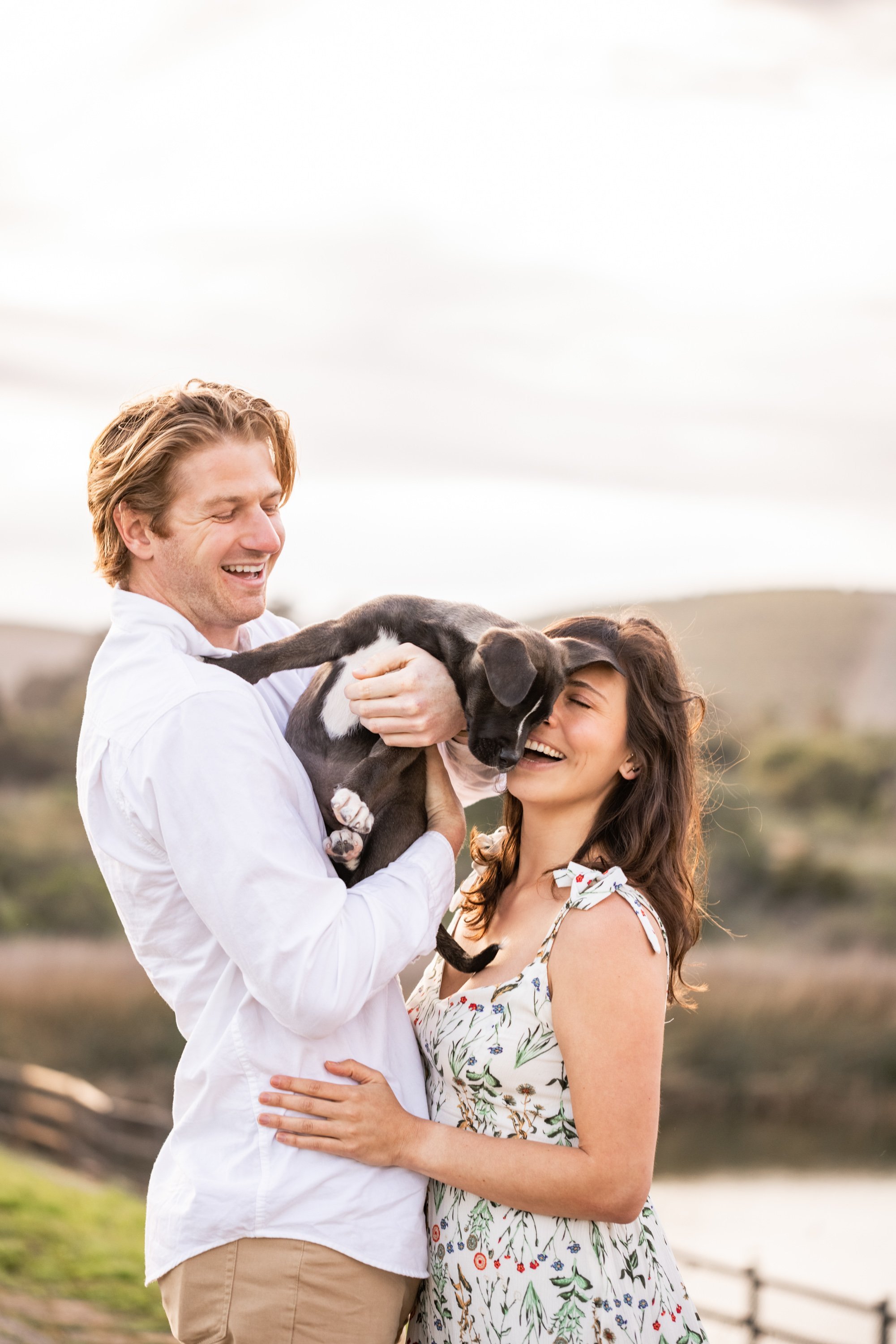 www.santabarbarawedding.com | Veils &amp; Tails Photography | Couple Holding Puppy at Engagement Shoots