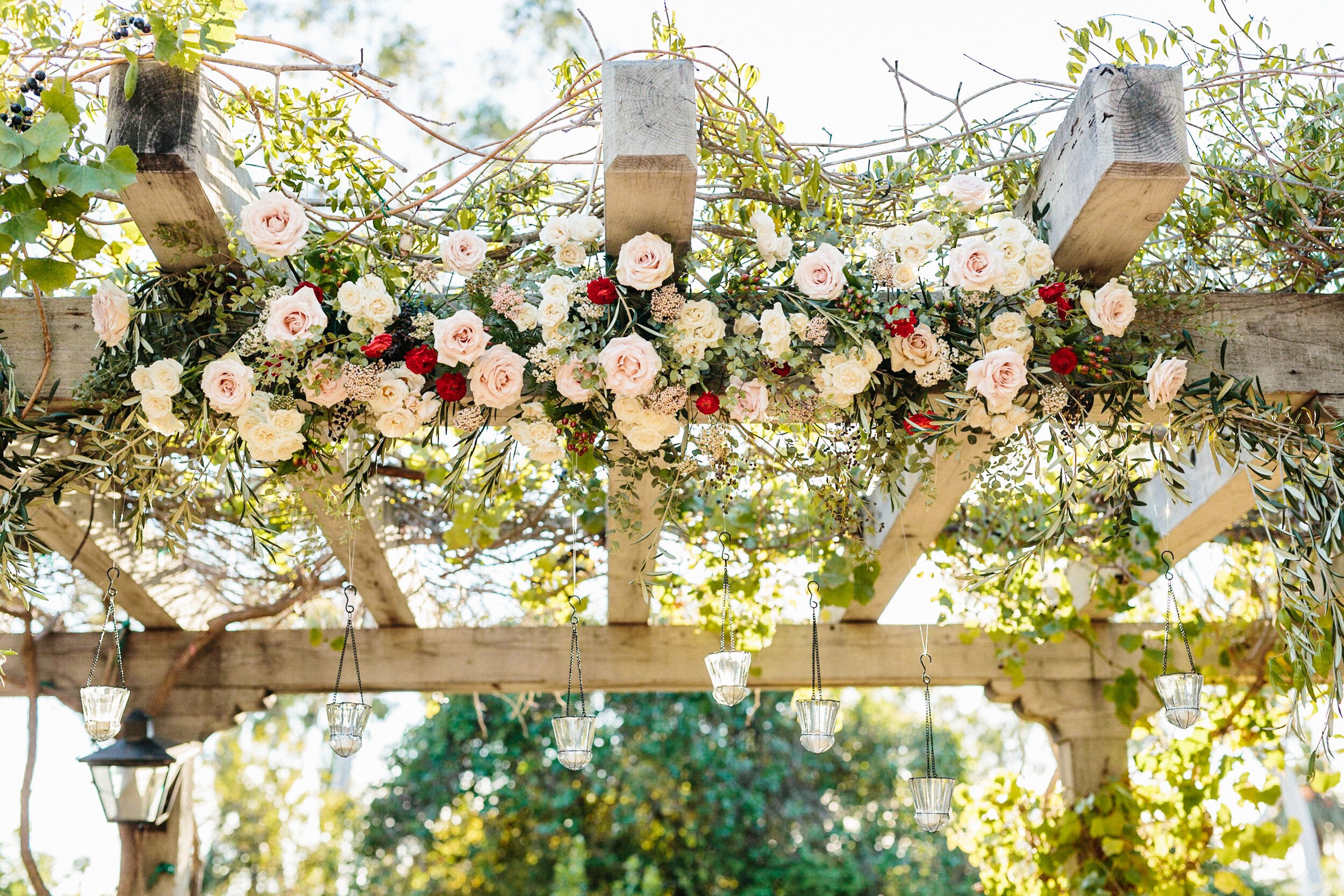 www.santabarbarawedding.com | Hannah Rose Gray Photography | Alexis Ireland Florals | Wedding Arch Decorated with Flowers