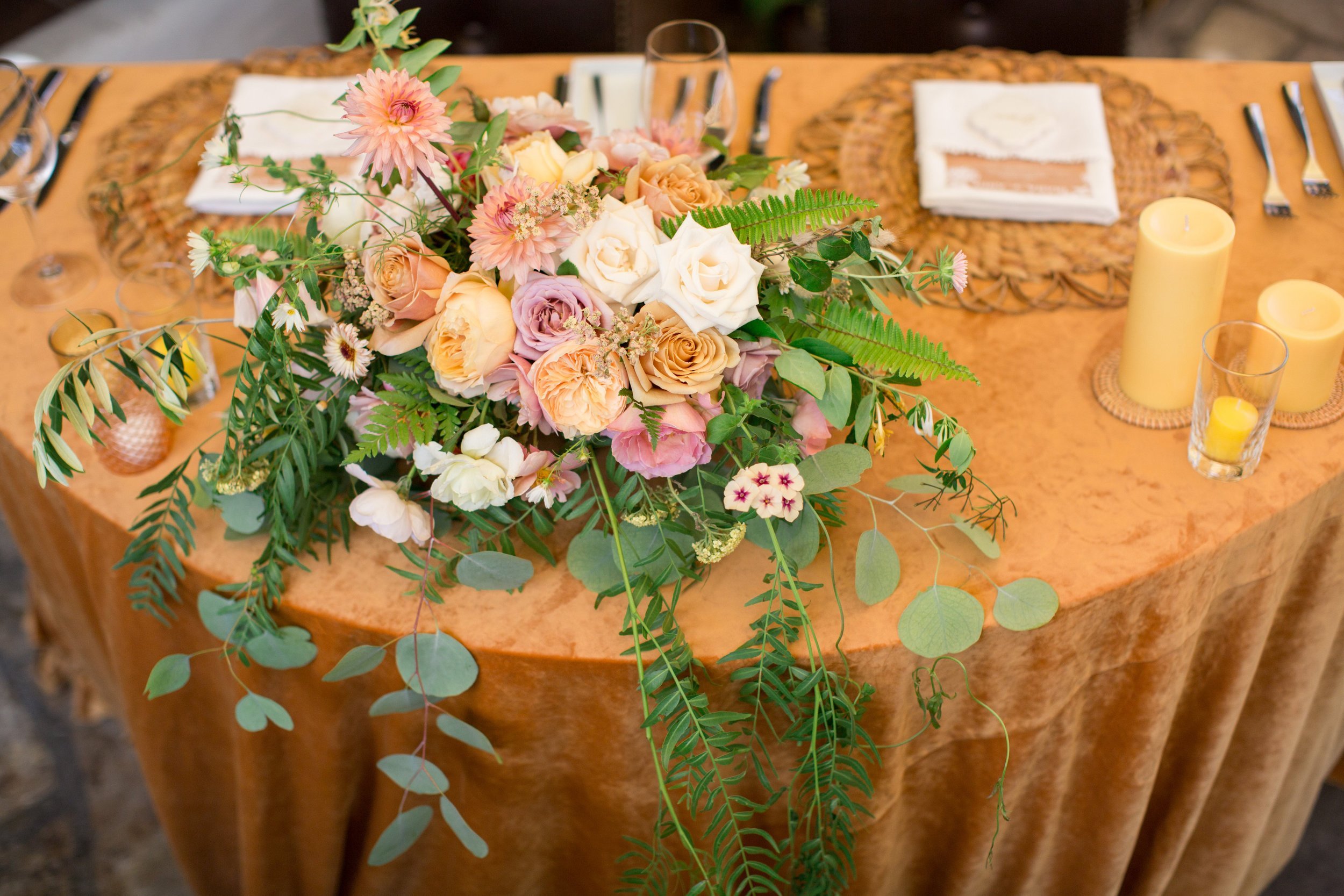 www.santabarbarawedding.com | Margaret Joan Florals | Anna J. Photography | Pink, White and Orange Flowers on the Couple’s Reception Table