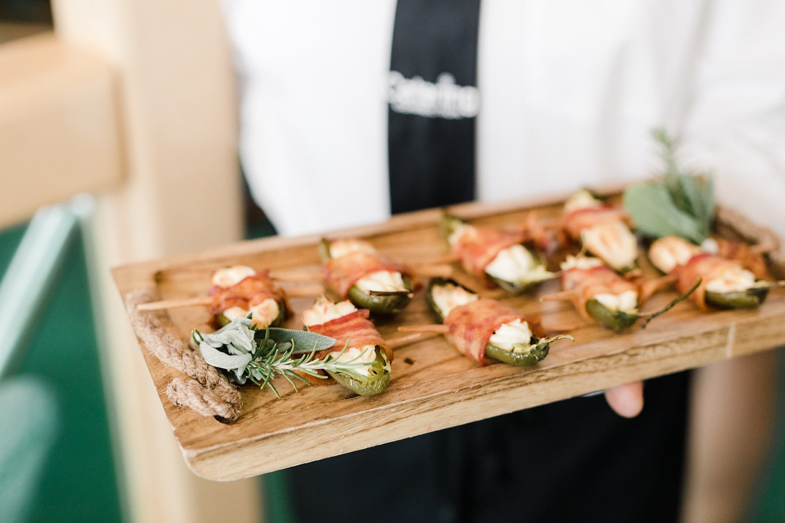 www.santabarbarawedding.com | Anna Delores Photography | Channel Cat Charters | Onyx + Redwood | Catering Connection | Bacon Wrapped Jalapeno Poppers Served by Waiter