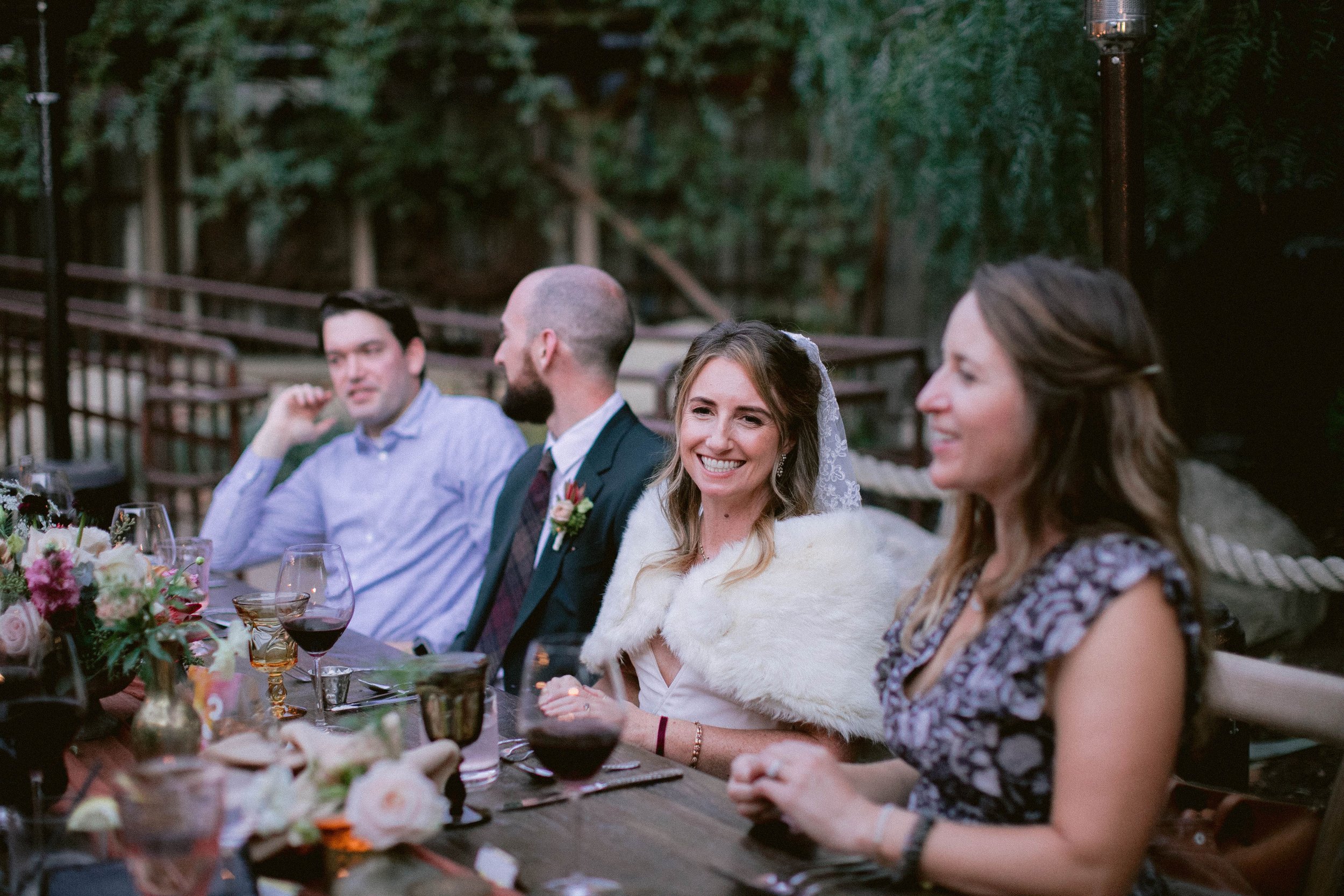 www.santabarbarawedding.com | Brittany Taylor Photography | Swell Studio Events | The Maker’s Son | Alpha Floral | Carlyle Salon | Otis + Pearl | Couple and Guests at Reception Table