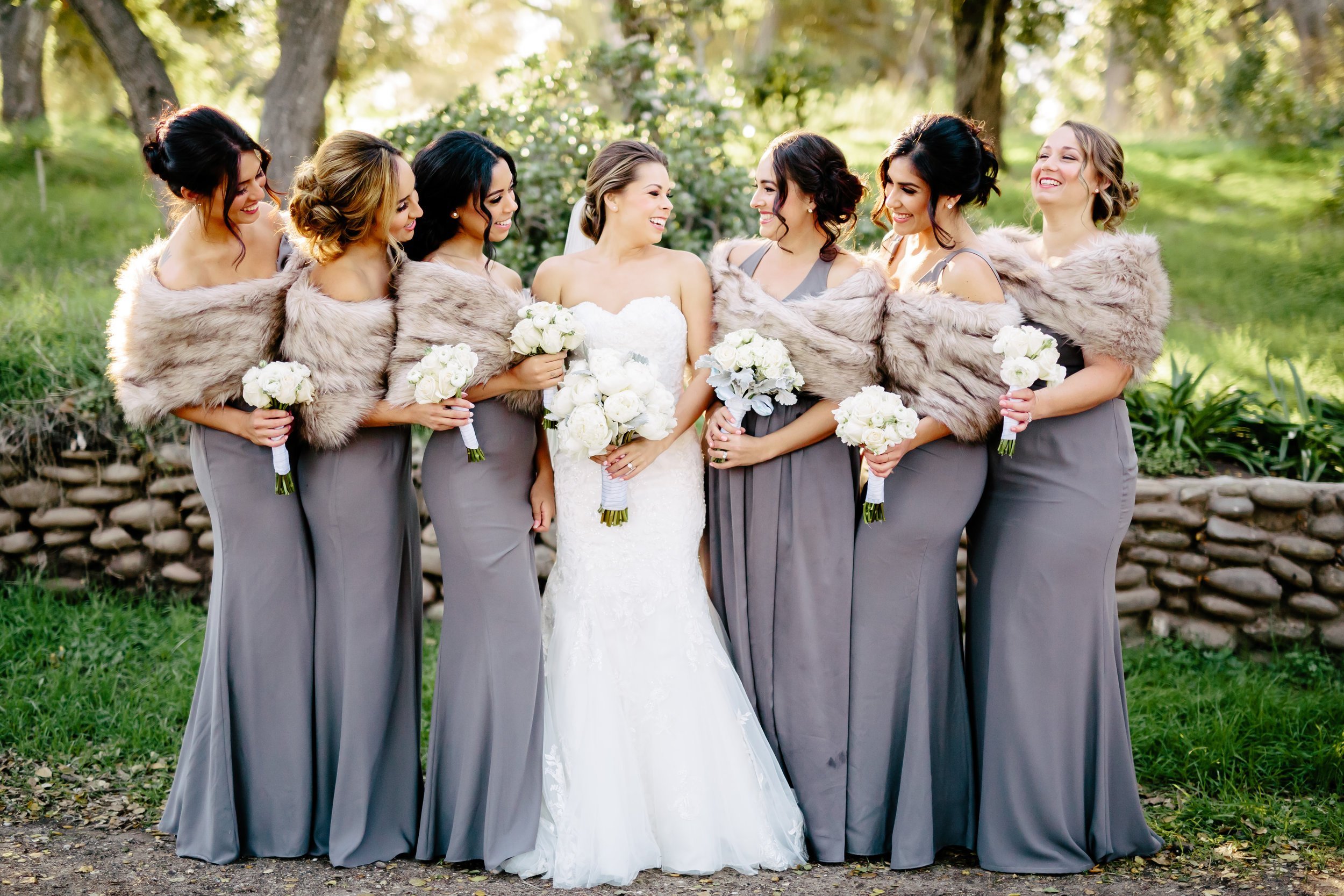 www.santabarbarawedding.com | Rewind Photography | Rancho La Patera &amp; Stow House | Bride and Bridesmaids in Fur Shaws 