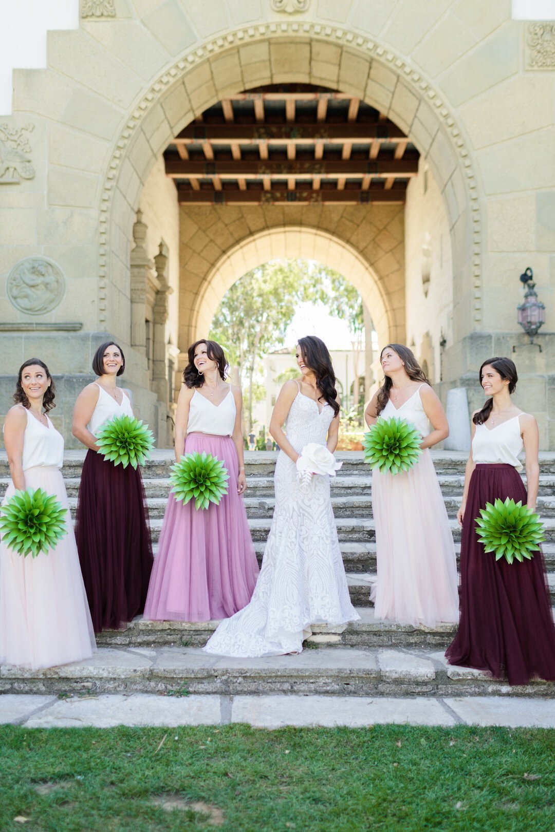www.santabarbarawedding.com | Kaitie Brainerd Photography | Santa Barbara Courthouse | Bride with Bridesmaids in Purple and Pink with Paper Bouquets