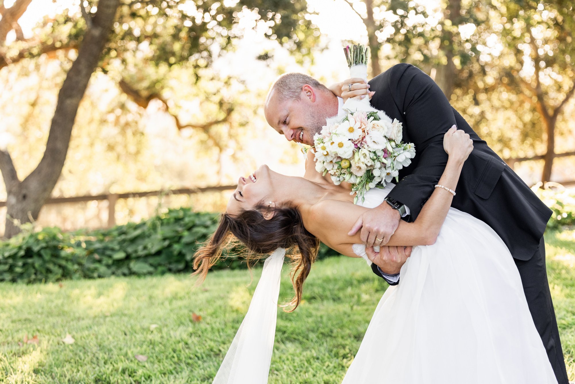 www.santabarbarawedding.com | Santa Ynez Private Residence | Veils &amp; Tails Photography | Bride and Groom with Bouquet 