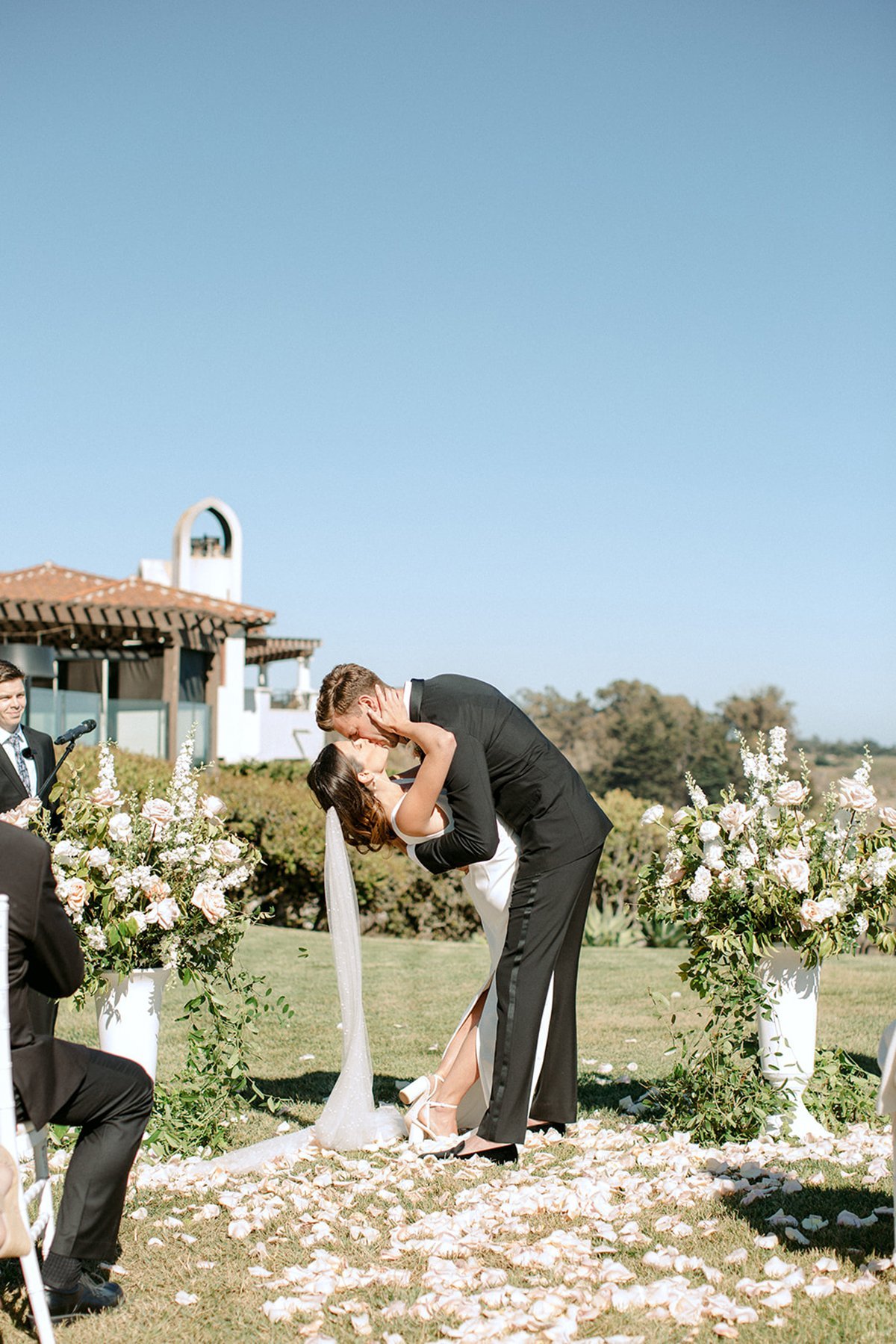 www.santabarbarawedding.com | Ali Beck Photography | LuckEleven Events | The Ritz-Carlton Bacara | Knot Just Flowers | Five Star AV | Ralph Lauren | Sarah Seven | Couple Kiss at Ceremony 