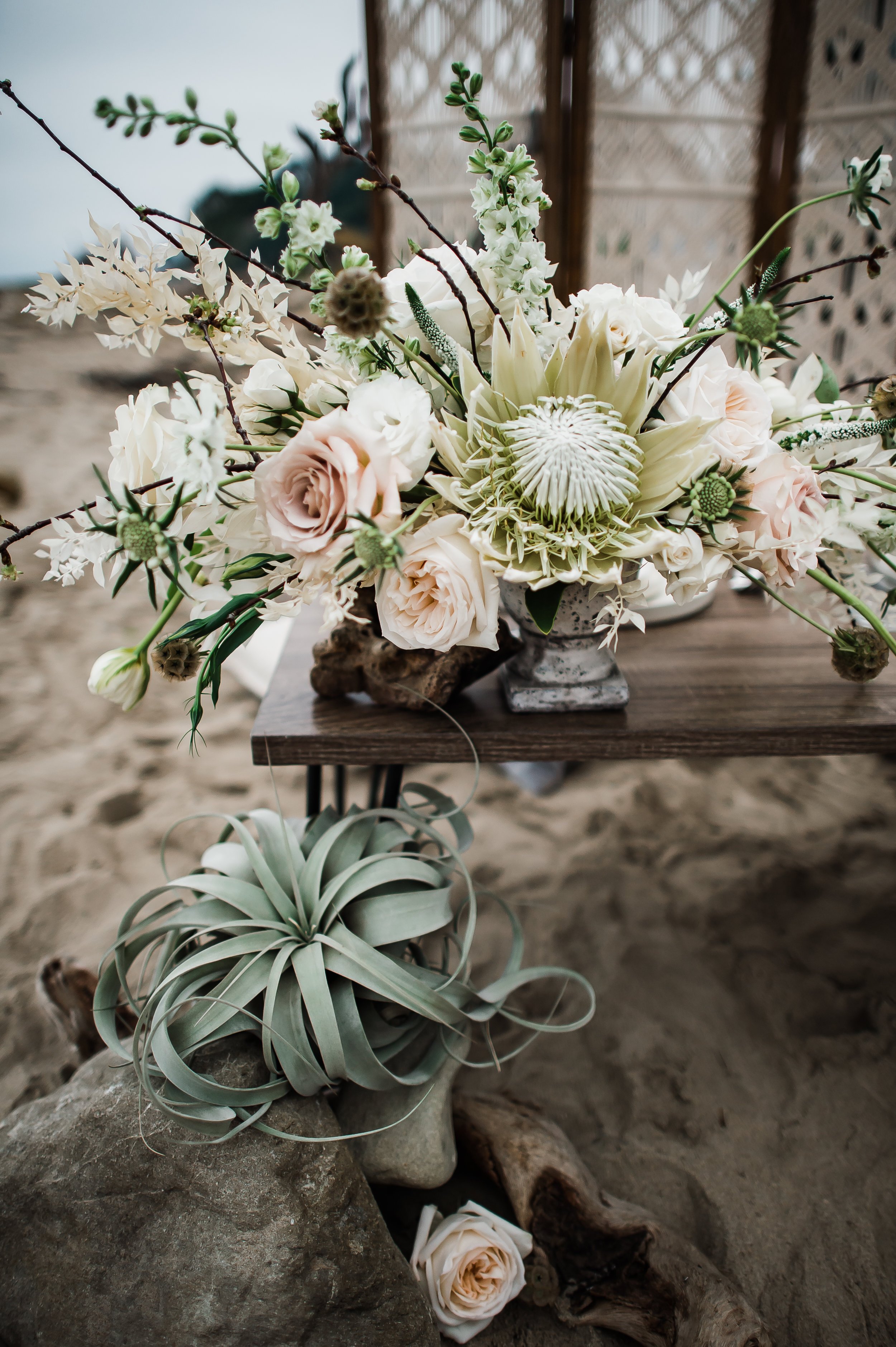 www.santabarbarawedding.com | Michelle Ramirez Photography | Fresch Events | Tangled Lotus | Florals on a Table on the Beach