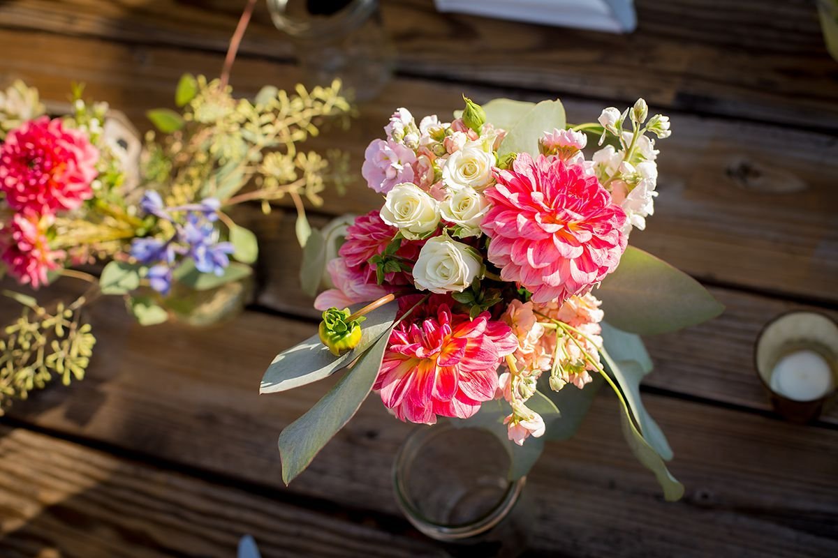 www.santabarbarawedding.com | Pacwest Blooms | Phillip Van Nastrand | Casitas Valley Farm | Small Pink Floral Arrangements on Reception Table