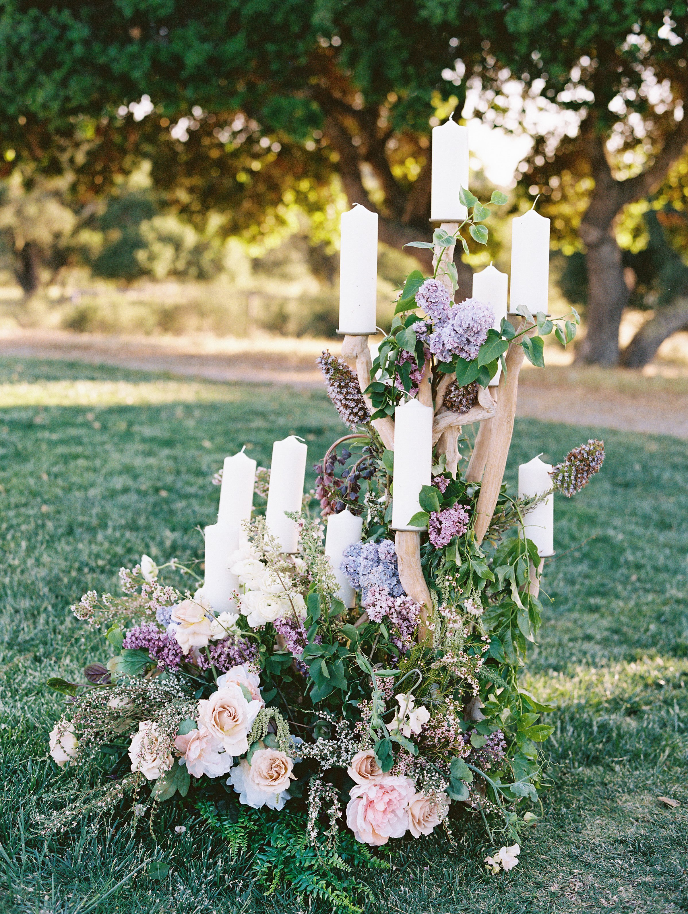 www.santabarbarawedding.com | Zaca Creek Ranch | White Sage Events | Grace Aston | Barefoot Floral | Candle and Floral Display at Ceremony 