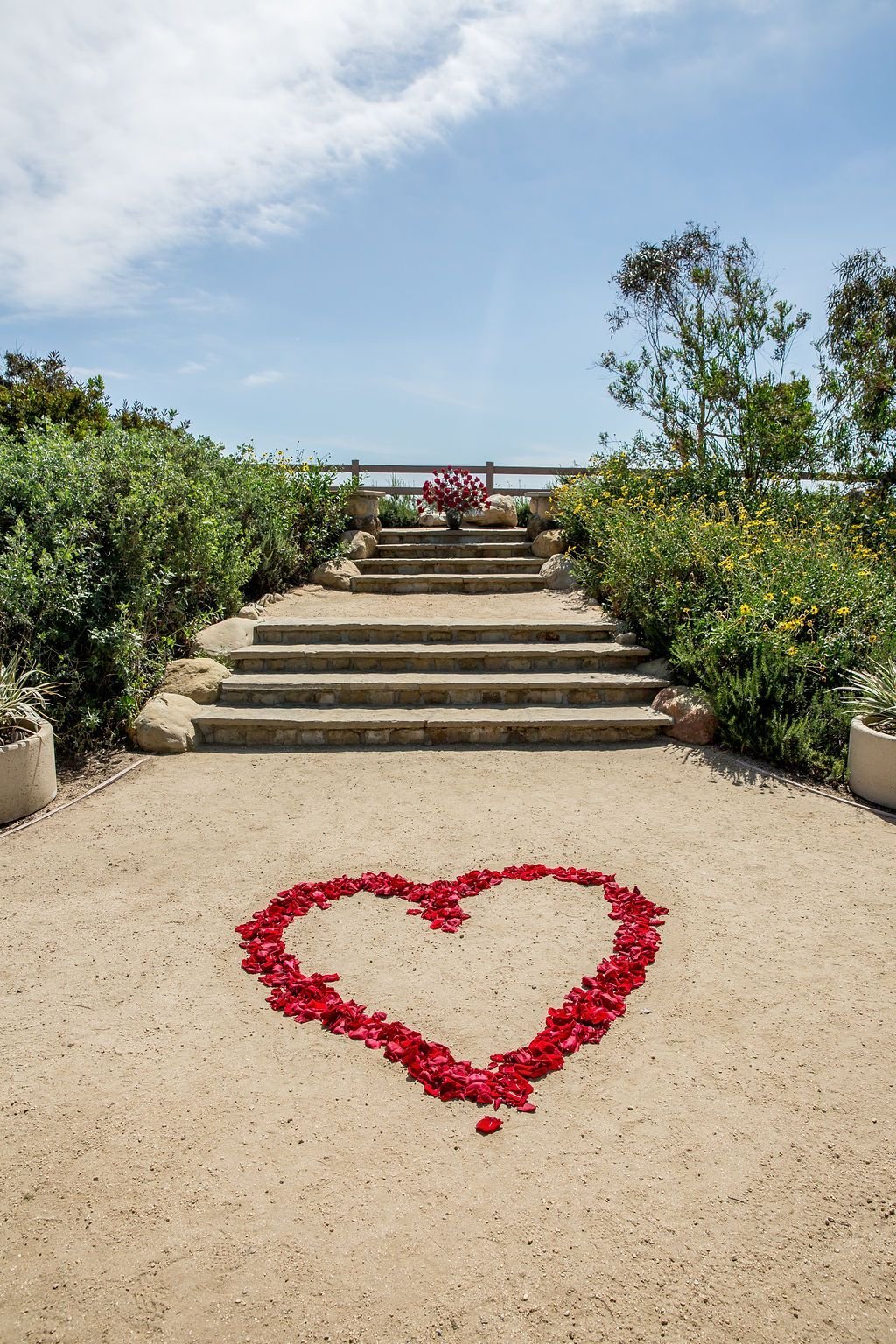 www.santabarbarawedding.com | Head &amp; Heart Photography | Felici Events | Heart Made Out of Red Flower Petals at the Ceremony 