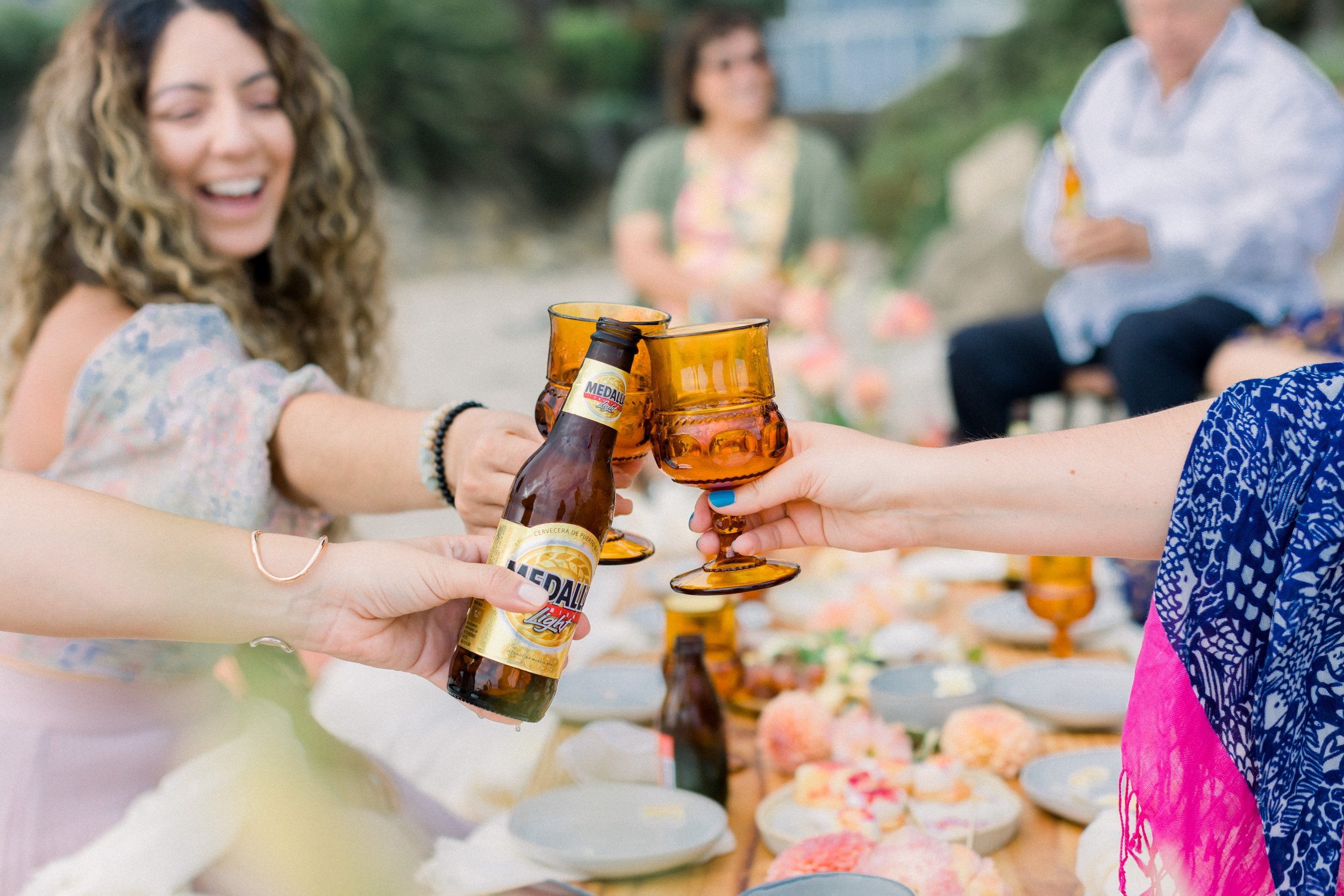 www.santabarbarawedding.com | James &amp; Jess Photography | Slate Catering | All Heart Rentals | Ella &amp; Louie | Guests Cheers at Picnic