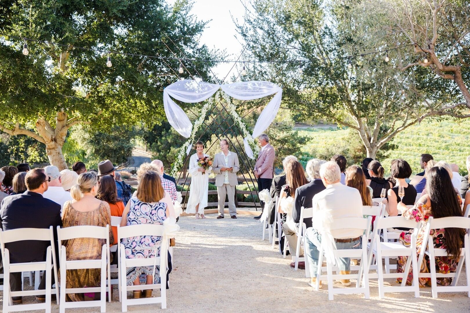 www.santabarbarawedding.com | Venue: Firestone Vineyard | Photographer: Just Kiss Collective | Wedding Dress: BHLDN | Wedding Ceremony