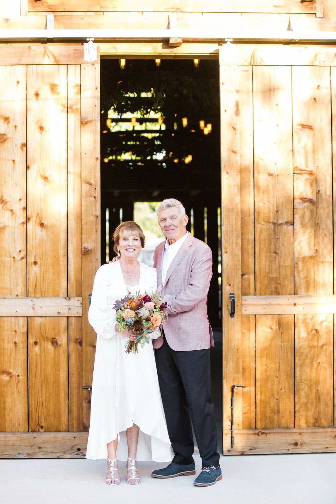 www.santabarbarawedding.com | Venue: Firestone Vineyard | Photographer: Just Kiss Collective | Bride and Groom Outside Reception Site