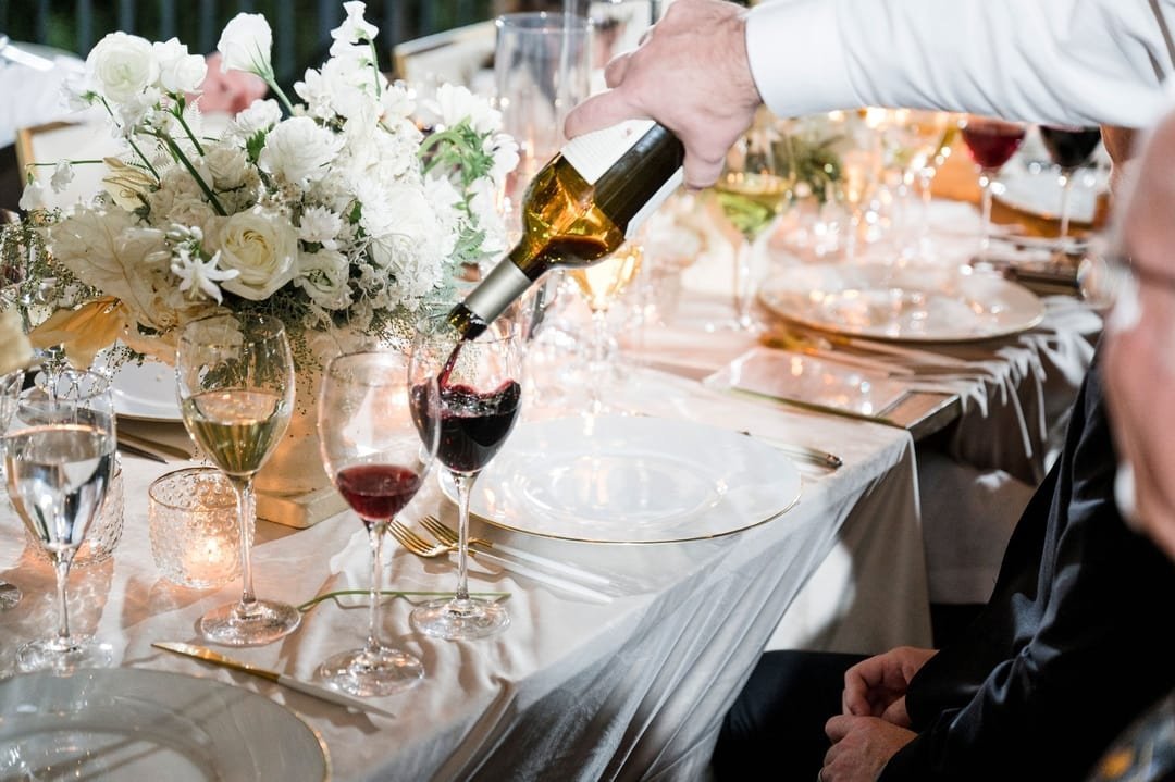 www.santabarbarawedding.com | Ojai Valley Inn | White Sage | Ellie Koleen Photography | Ojala Floral | Amigo Party Rentals | Theoni Collection | Olivella | La Tavola | Serving Wine at Reception 