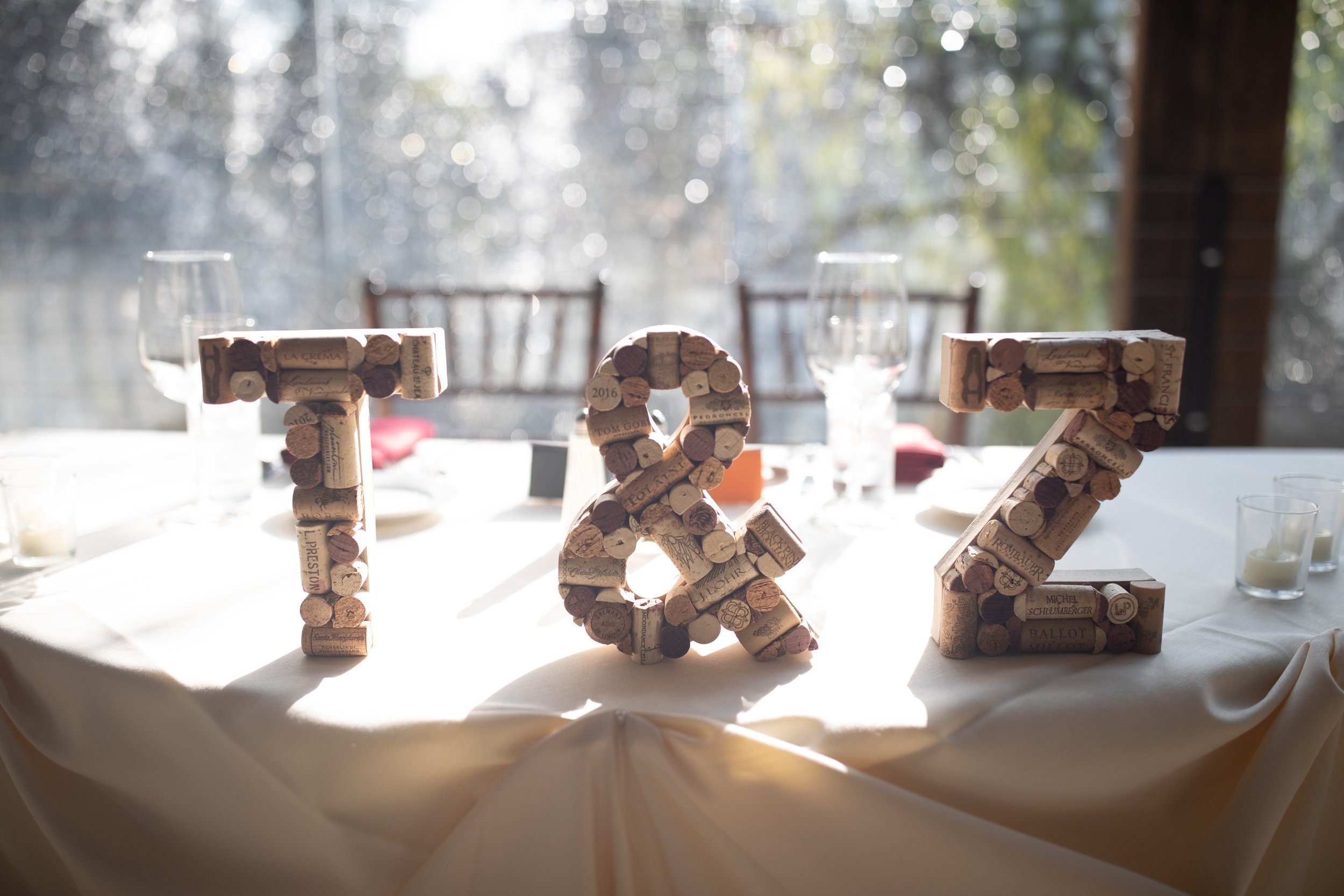 www.santabarbarawedding.com | Calamigos Ranch | Events by Fran | Yanira Scalise | The Exotic Green Garden | Bride and Groom’s Initials Made Out of Wine Corks