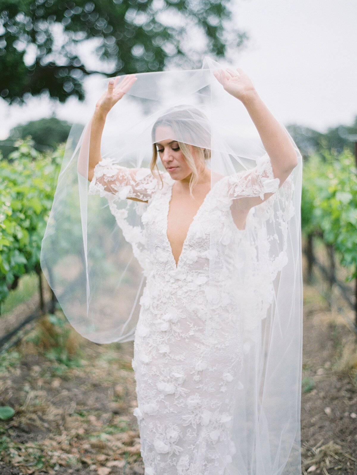 www.santabarbarawedding.com | Roblar Farm | Smith and Murphy | Esther Sun | Velvet Blooms | Janet Villa | Marchesa | Bride Lifting Her Veil