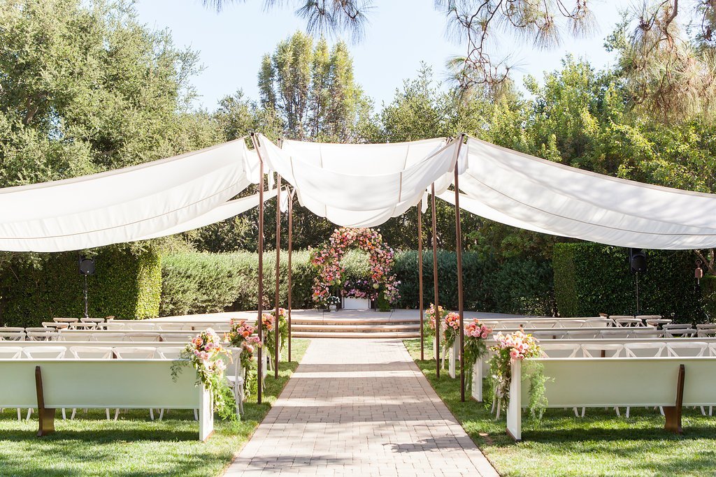 www.santabarbarawedding.com | Melissa Musgrove Photography | Ambient Event Design | White Drapery Hanging Above the Ceremony Chairs