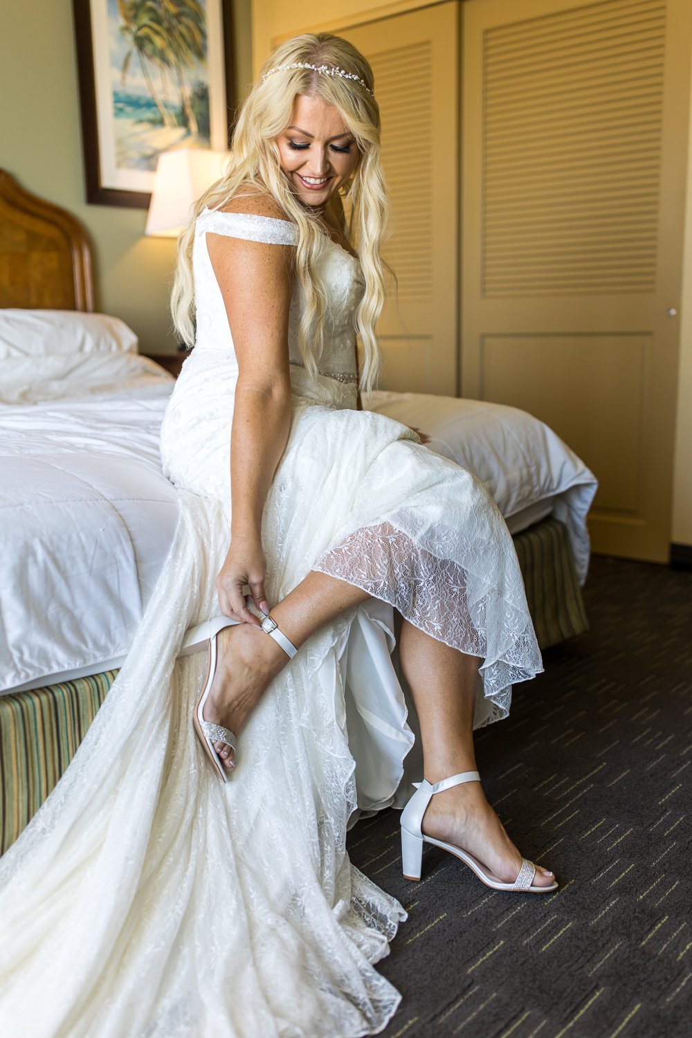 www.santabarbarawedding.com | Elizabeth Victoria | Hilton Mandalay Beach Hotel | Three Sisters Event Planning | Artistry by Cheyenne | Rise Ojai | David’s Bridal | Bride Putting on Her Heels