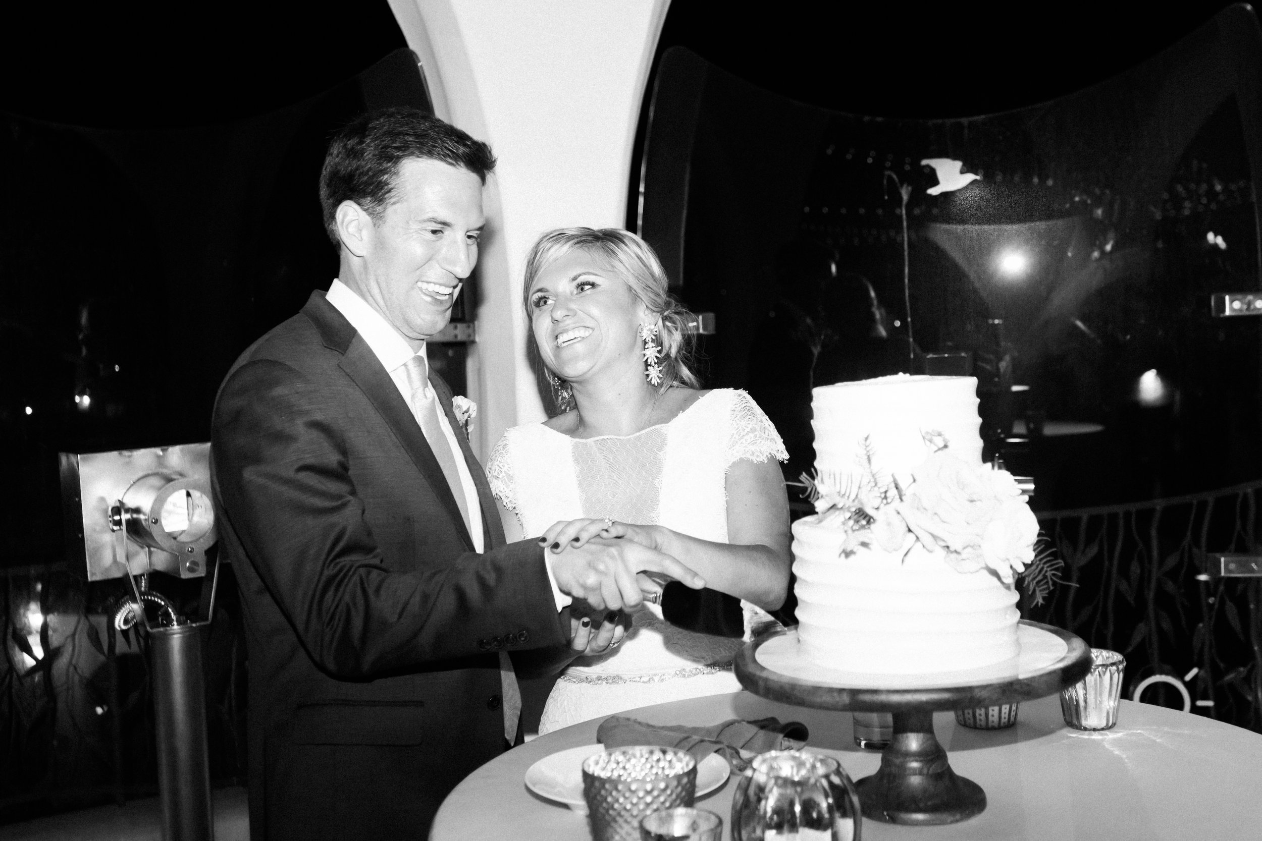 www.santabarbarawedding.com | Our Lady of Mount Carmel | MOXI | Ann Johnson | Islay Events | James &amp; Jess | Bride and Groom | Cutting the Cake