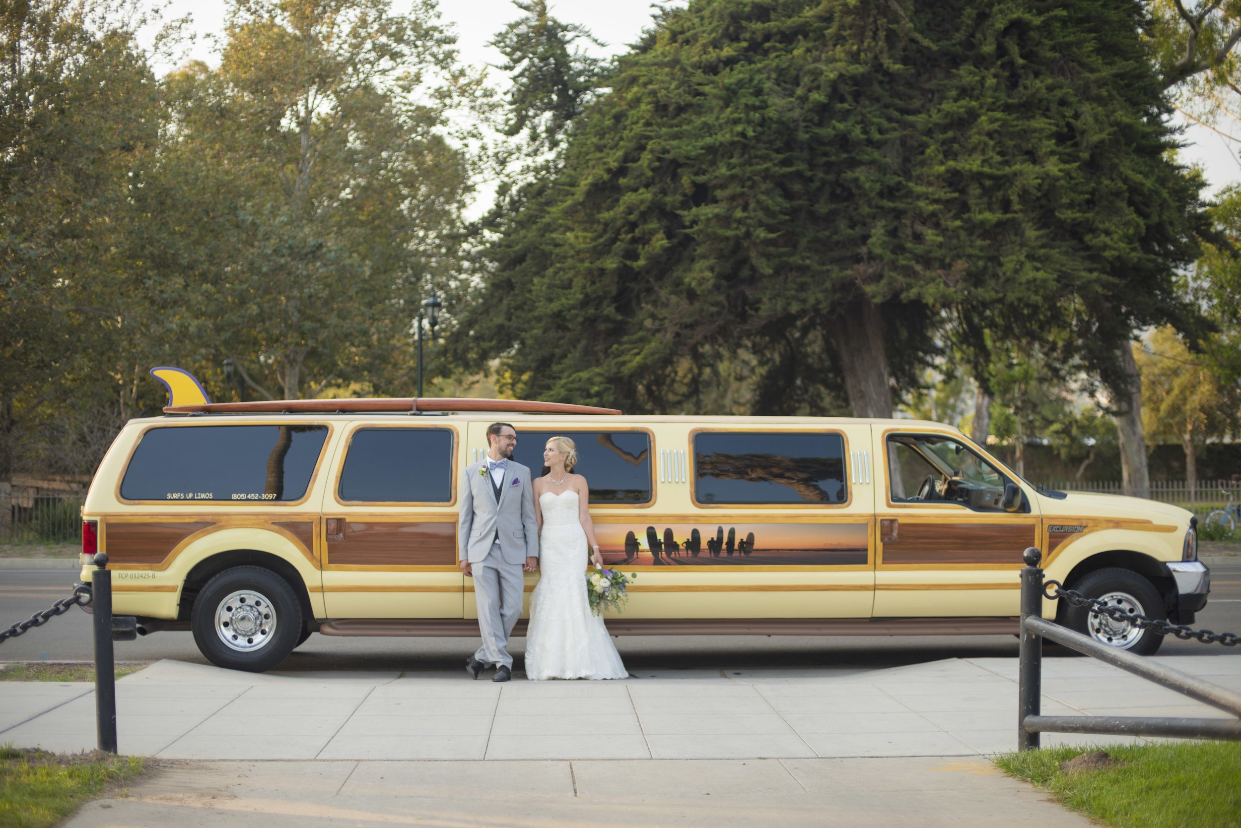 www.santabarbarawedding.com | By Cherry Photography | Chase Palm Park | Bride and Groom and Limo