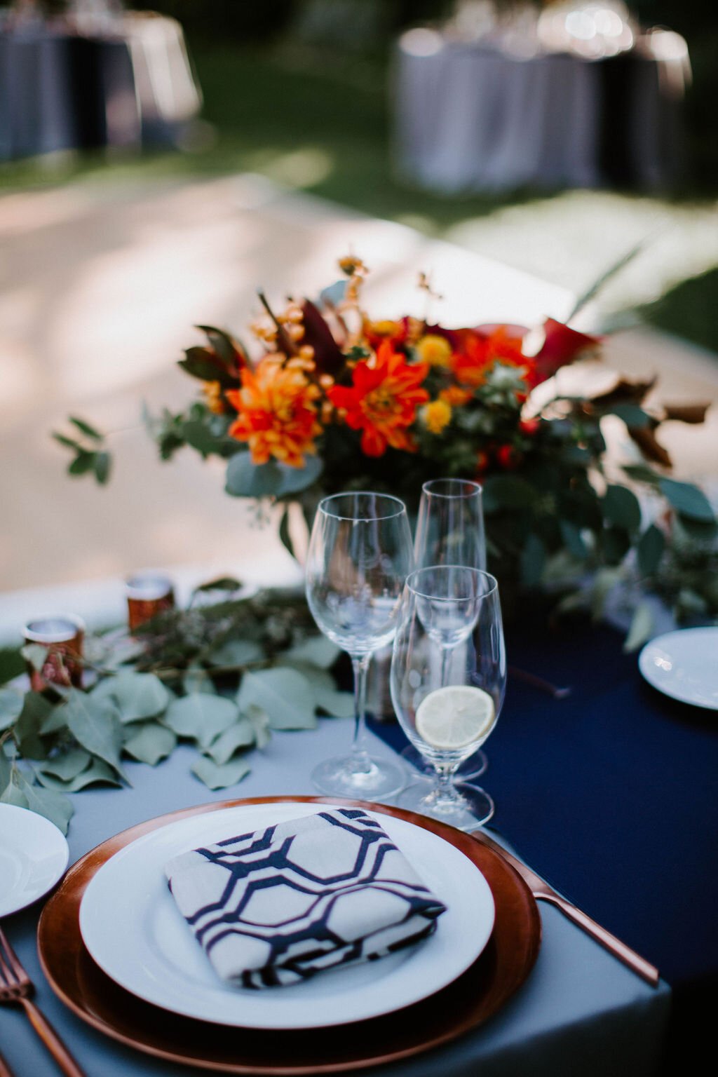 www.santabarbarawedding.com | Fancy Free Photographer | Lavender Inn | Ojai Blooms | Ventura Rentals | outdoor wedding reception blue and orange table decor