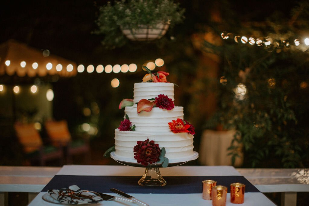 www.santabarbarawedding.com | Fancy Free Photographer | Lavender Inn | Ojai Blooms | Ventura Rentals | Susie Cakes | three-tier simple wedding cake with flowers