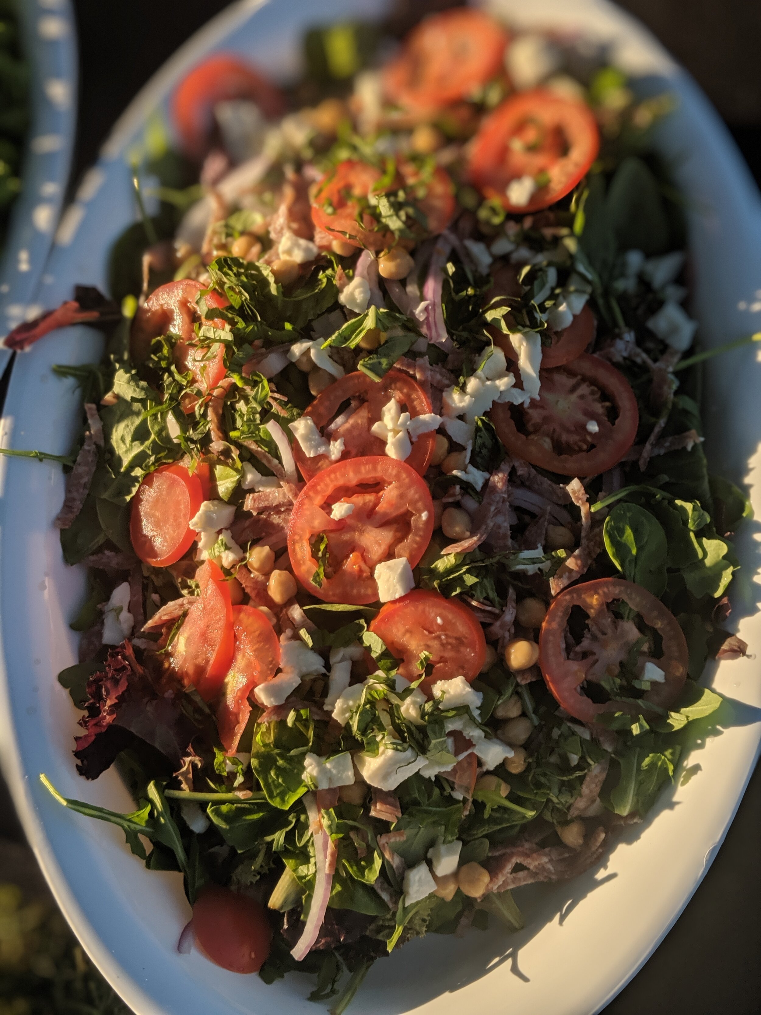 www.santabarbarawedding.com | Firefly Pizza Company | Salad Appetizer with Lettuce, Tomatoes, Onion, and Feta Cheese