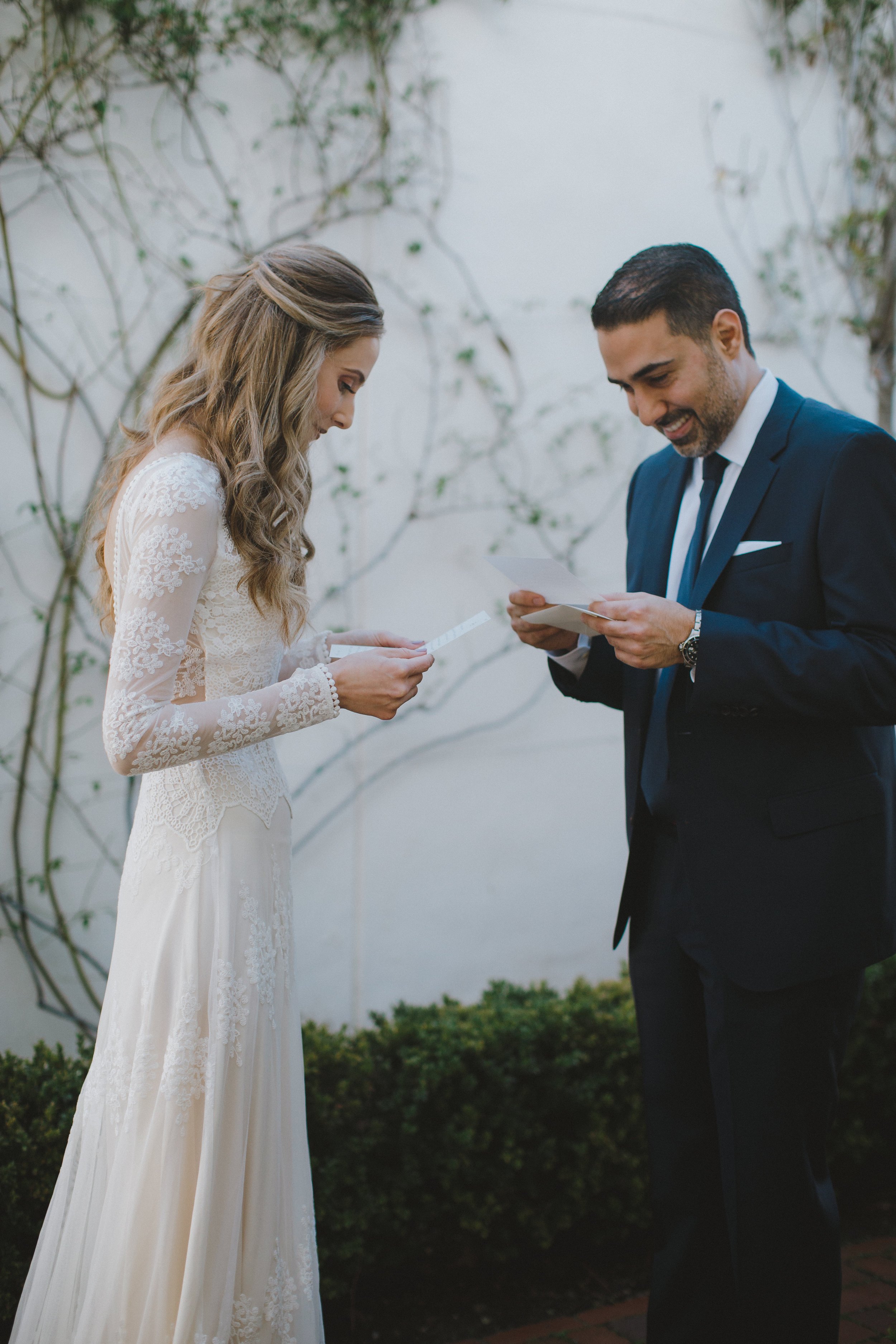 www.santabarbarawedding.com | Ryanne Bee Photography | Santa Barbara Courthouse | Belmond El Encanto | Dreamers and Lovers | Bride and Groom Reading Vows 