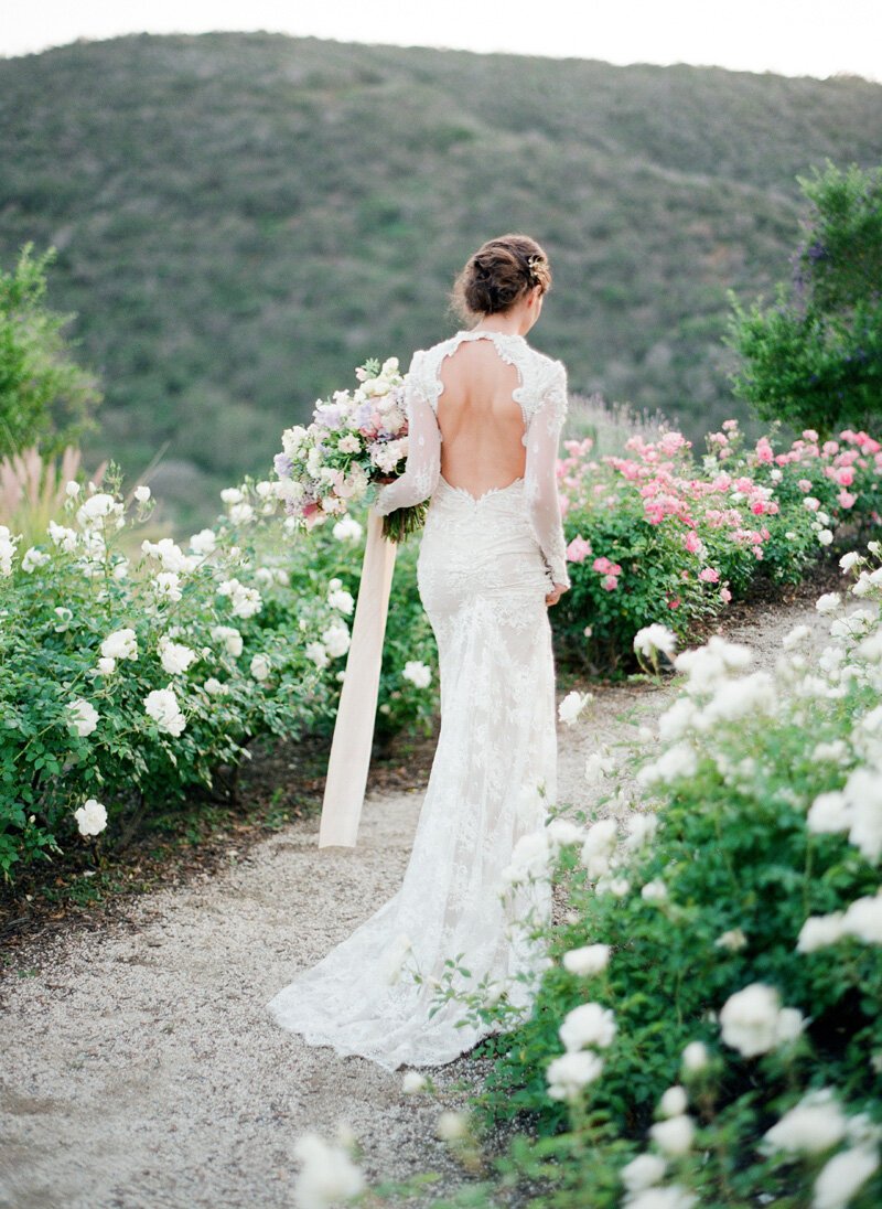 www.santabarbarawedding.com | Jose Villa Photography | Back of a Fitted Lace Dress with an Open Back and Long Sleeves