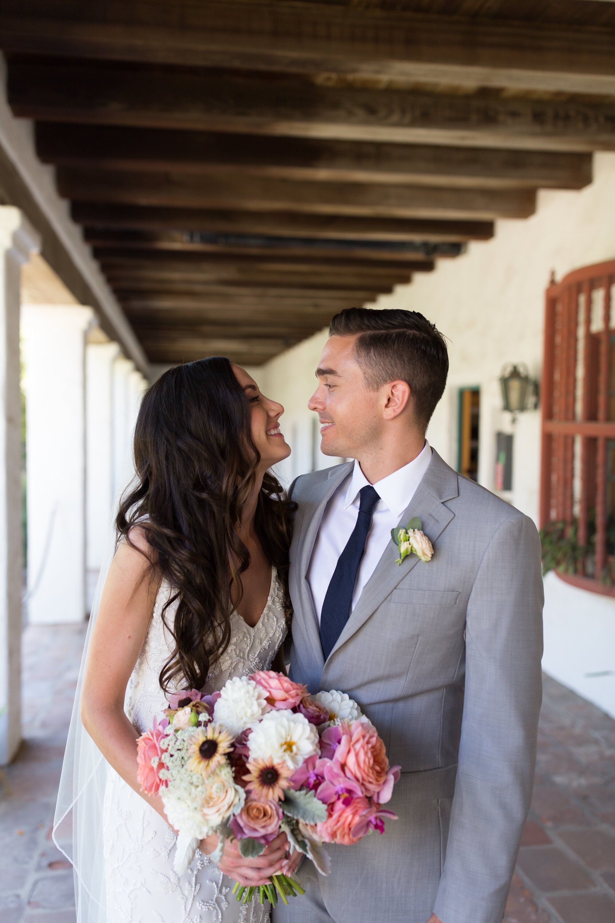 www.santabarbarawedding.com | Kelsey Crews Photo | Santa Barbara Mission | Ella &amp; Louie | Bride and Groom Outside the Church 