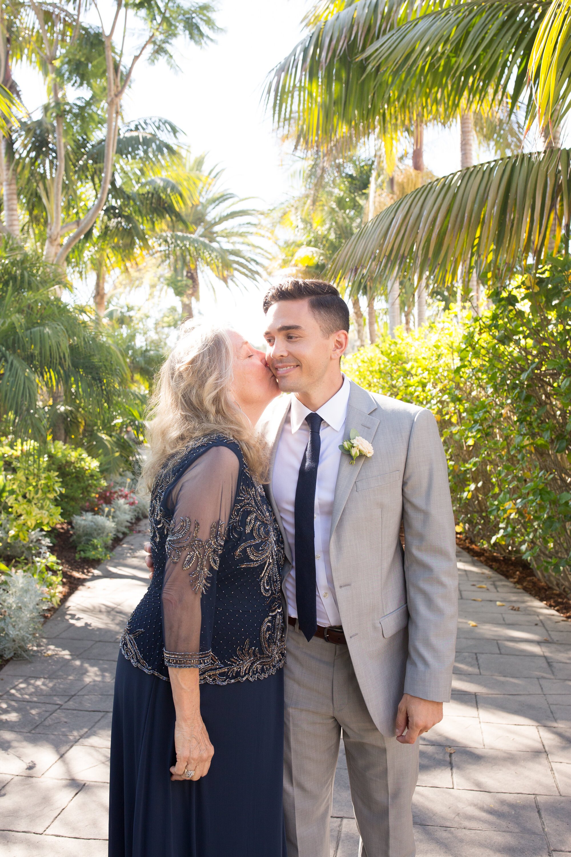 www.santabarbarawedding.com | Kelsey Crews Photo | Ella &amp; Louie | Groom and His Mom Among the Palm Trees