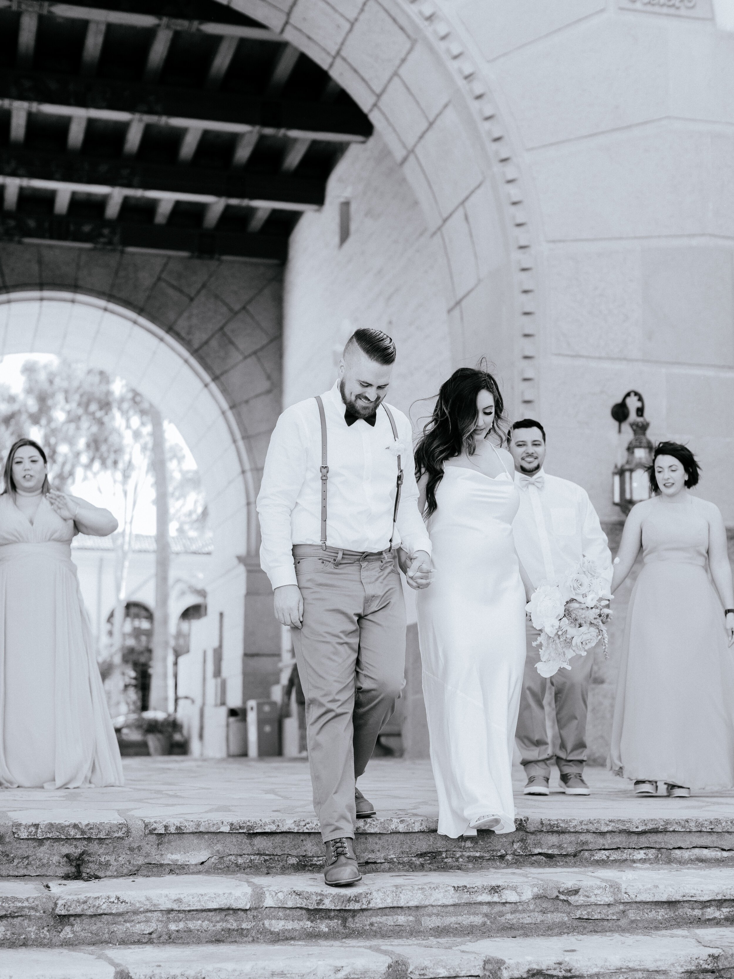 www.santabarbarawedding.com | Chris J. Evans | Santa Barbara Courthouse | Santa Barbara Elopement | Ella &amp; Louie | Page Beauty | Bride and Groom Walking Down the Steps