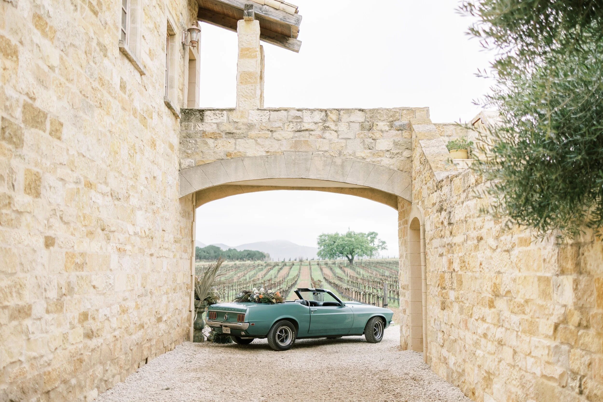 Visionary Sunstone Villa Styled Shoot with a Blue Vintage Mustang