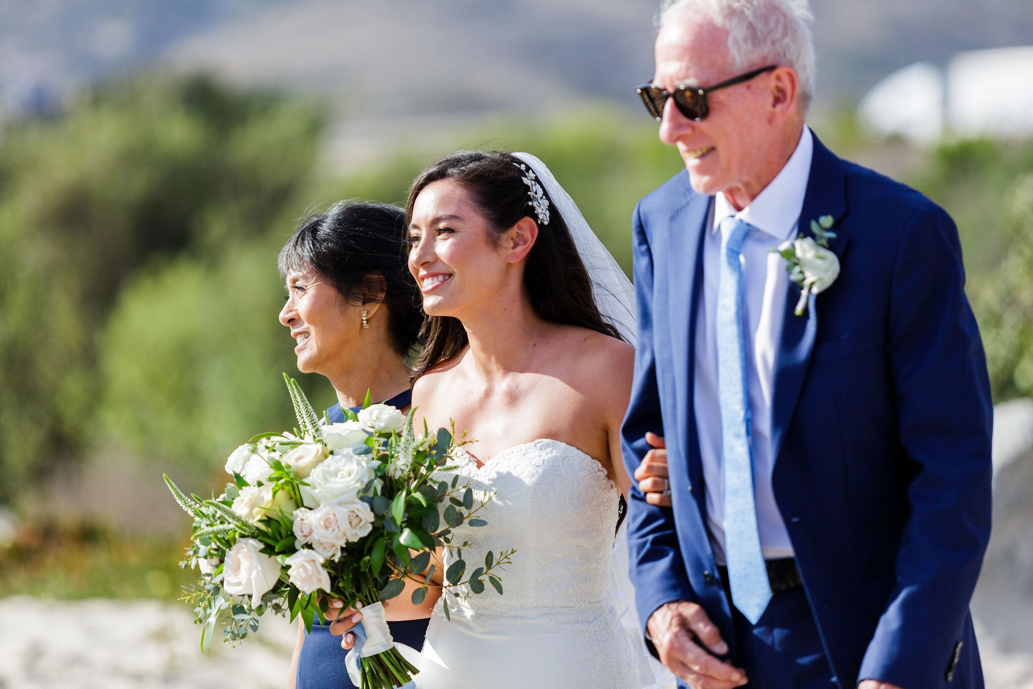 www.santabarbarawedding.com | Head &amp; Heart Photography | Rincon Beach Club | Events by Rincon | The Twisted Twig | Bride Walking Into the Ceremony with Parents