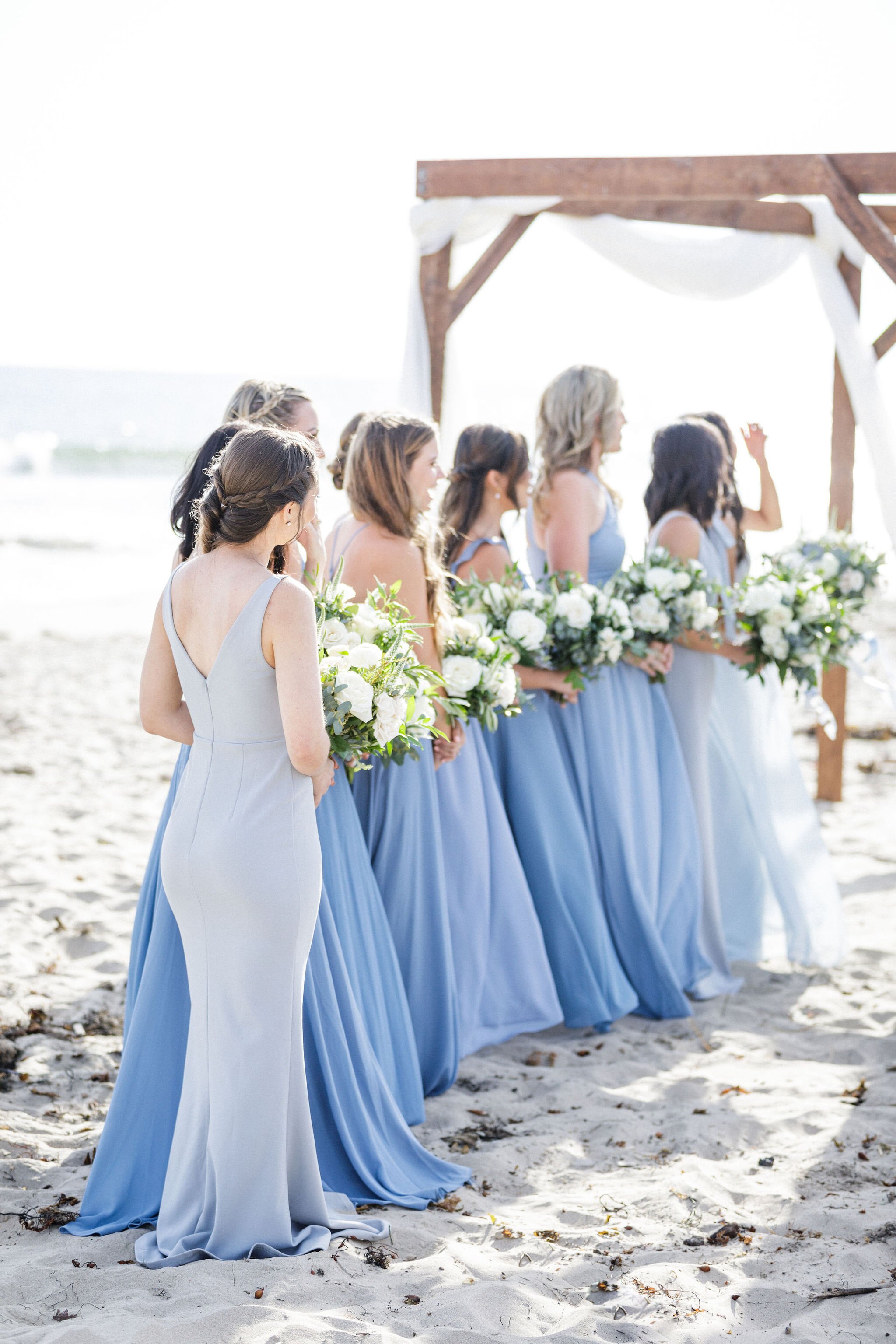 www.santabarbarawedding.com | Head &amp; Heart Photography | Rincon Beach Club | Events by Rincon | The Twisted Twig | Bridesmaids Lined Up at the Ceremony 